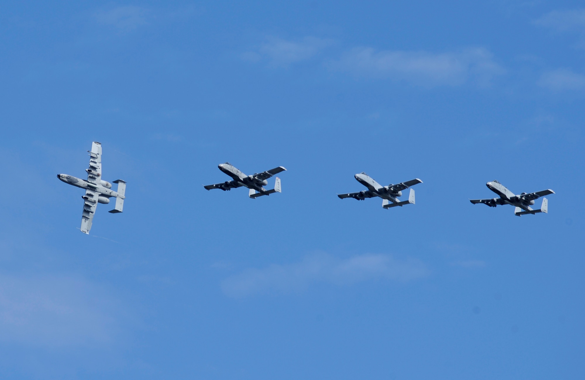 U.S. Air Force A-10C Thunderbolt IIs from Moody Air Force Base, Ga., fly over the flightline at Tyndall Air Force Base, Fla., Oct. 6, 2016. Approximately 30 aircraft were ordered to evacuate after officials at the 23rd Wing assessed the threat of Hurricane Matthew. (U.S. Air Force photo by Senior Airman Solomon Cook/Released)