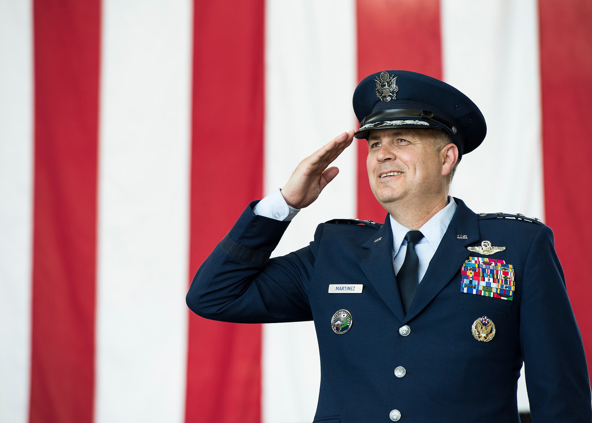 U.S. Air Force Lt. Gen. Jerry P. Martinez, incoming United States Forces, Japan and 5th Air Force commander, salutes during his Assumption of Command ceremony October 6, 2016, at Yokota Air Base, Japan. Martinez was the former Headquarters Air Mobility Command director of operations at Scott Air Force Base, Ill. (U.S. Air Force photo by Airman 1st Class Donald Hudson/Released)
