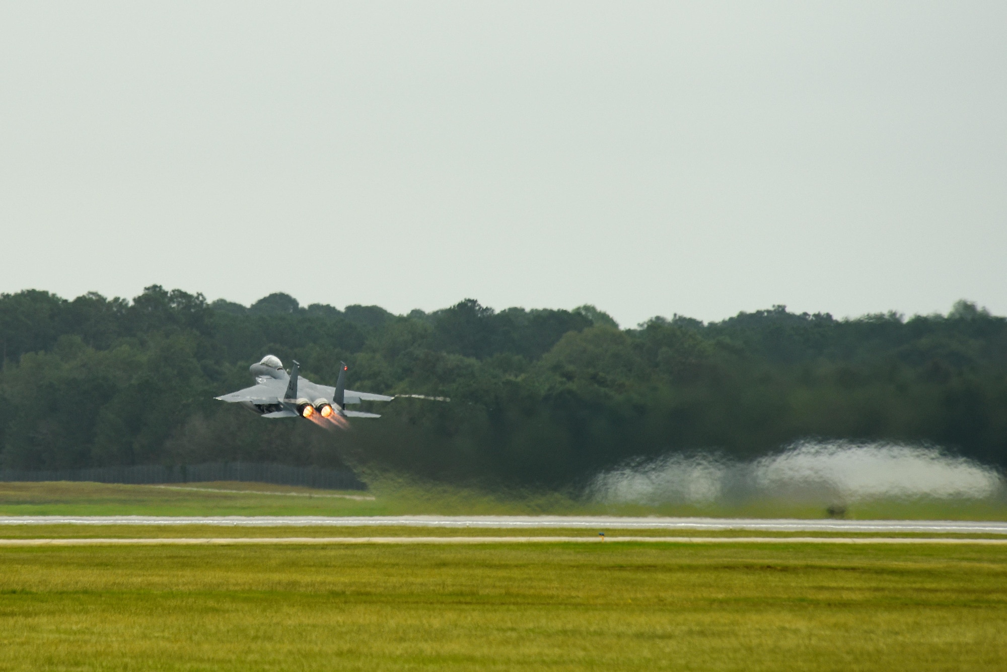 An F-15E Strike Eagle from the 335th Fighter Squadron takes off as a precautionary measure to avoid severe weather associated with Hurricane Matthew, Oct. 6, 2016, at Seymour Johnson Air Force Base, North Carolina. More than 40 F-15E Strike Eagles were repositioned to Barksdale Air Force Base, Louisiana. (U.S. Air Force photo by Airman Shawna L. Keyes)