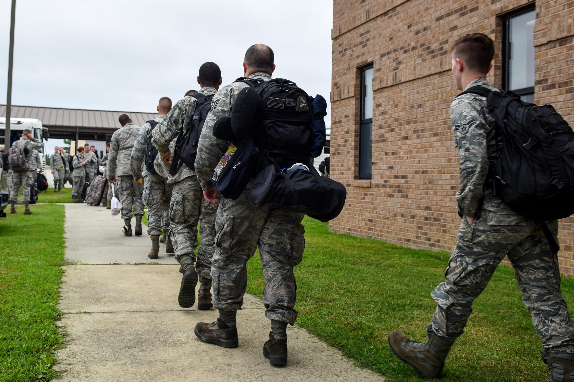 Team Seymour aircraft support personnel prepare to depart the area as a precautionary measure to avoid severe weather associated with Hurricane Matthew, Oct. 6, 2016, at Seymour Johnson Air Force Base, North Carolina. More than 40 F-15E Strike Eagles and six KC-135R Stratotanker aircraft repositioned to Barksdale Air Force Base, Louisiana. (U.S. Air Force photo by Airman Shawna L. Keyes)