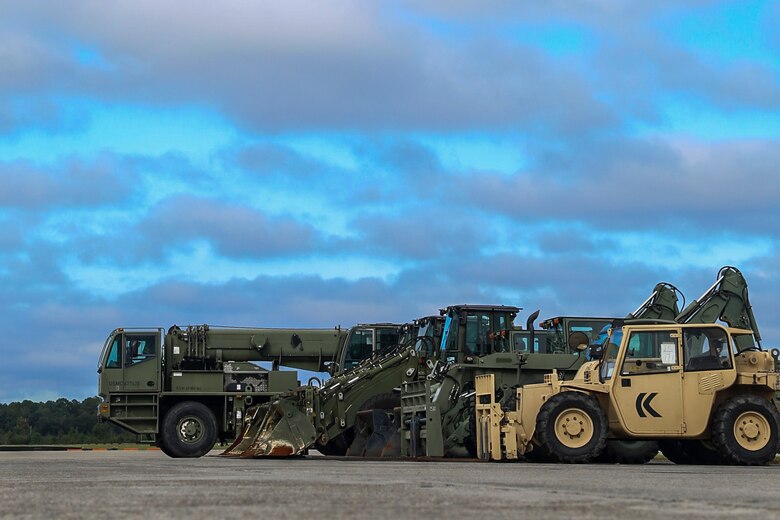 Heavy equipment is staged aboard Marine Corps Air Station Beaufort Oct. 6. As Matthew makes its way up the Southeast coastal line, the air station put in place procedures to prepare for base recovery which included moving the heavy equipment to a centralized location which will assist with conducting base cleanup if necessary. 