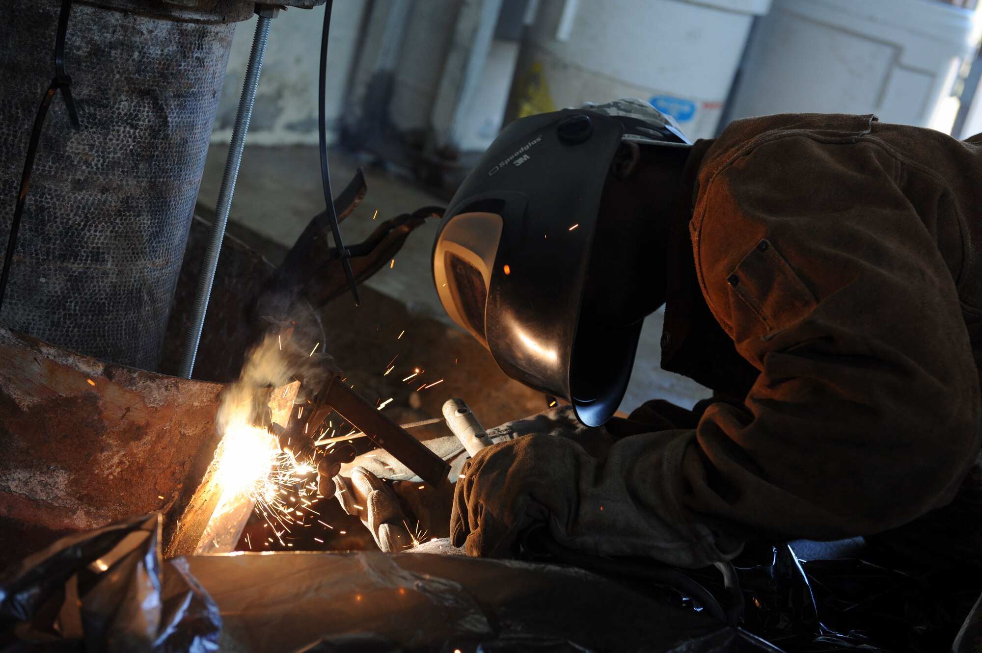 Senior Airman Gilbert Julien, 8th Civil Engineering Squadron Structures journeyman, secures a concrete through coupler at Kunsan Air Base, Republic of Korea, Oct. 6, 2016. 8th CES members are responsible for maintaining water treatment facilities throughout the base. These facilities provide airmen with potable water so they are continually able to Defend the Base, Accept Follow-On Forces and Take the Fight North. (U.S. Air Force photo by Senior Airman Michael Hunsaker/Released)