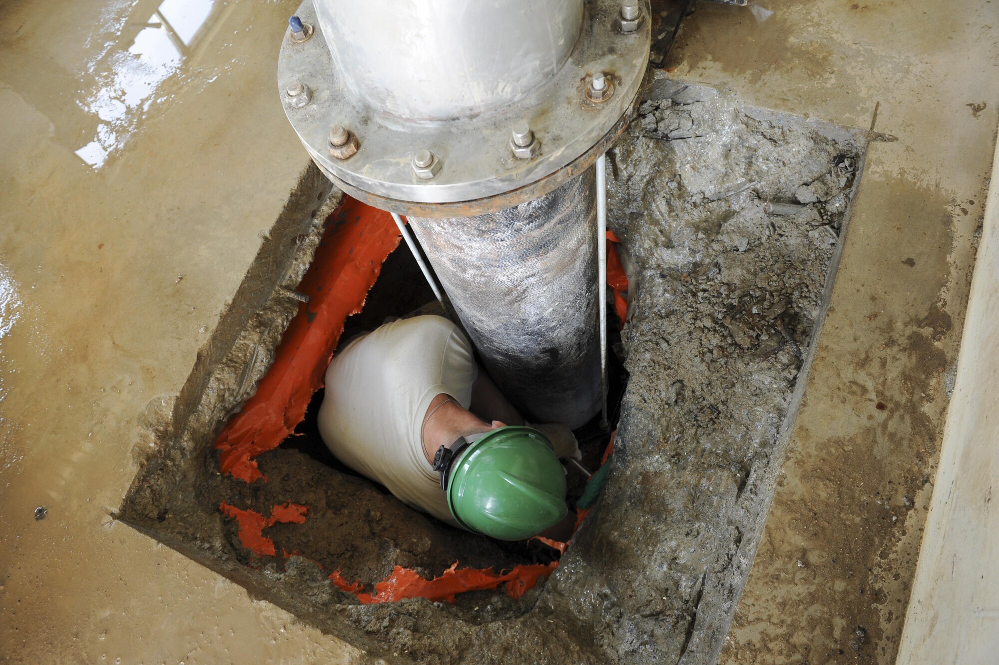 Staff Sgt. Kevin Watters, 8th Civil Engineering Squadron Liquid Fuels noncommissioned officer in charge, replaces a mechanical joint at Kunsan Air Base, Republic of Korea, Oct. 6, 2016. 8th CES members are responsible for maintaining water treatment facilities throughout the base. These facilities provide airmen with potable water so they are continually able to Defend the Base, Accept Follow-On Forces and Take the Fight North. (U.S. Air Force photo by Senior Airman Michael Hunsaker/Released)