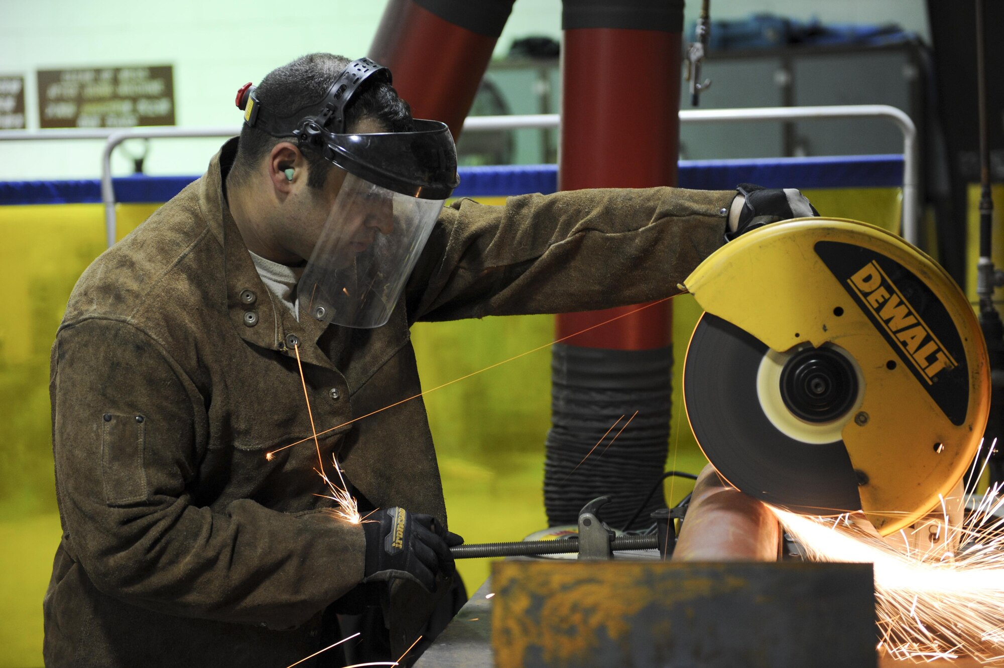 Staff Sgt. Jeffery Grasso, 8th Civil Engineering Squadron Structures craftsman, cuts an elbow support stand to size at Kunsan Air Base, Republic of Korea, Oct. 6, 2016. 8th CES members are responsible for maintaining water treatment facilities throughout the base. These facilities provide airmen with potable water so they are continually able to Defend the Base, Accept Follow-On Forces and Take the Fight North. (U.S. Air Force photo by Senior Airman Michael Hunsaker/Released)