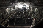 More than 30 members of the 621st Contingency Response Wing aboard a C-17 Globemaster III at Joint Base McGuire-Dix-Lakehurst, N.J. wait for equipment to be loaded on before takeoff on their way to Port-au-Prince, Haiti in response to Hurricane Matthew, October 6, 2016. The CRW is supporting the government of Haiti's request for humanitarian assistance. Once on the ground, the CRW will provide assistance by facilitating the movement of humanitarian aid and cargo.