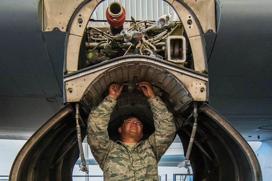 Air Force Senior Airman Jeremiah Davidson replaces a turbine overheat detector on a C-130H Hercules in Cheyenne, Wyo., Sept. 26, 2016. The aircraft, assigned to the 153rd Airlift Wing, is undergoing an engine enhancement modification and will begin an operational use evaluation test program at the jointly run Air National Guard and Air Force Reserve test center in Tucson, Ariz. Air National Guard photo by Senior Master Sgt. Charles Delano