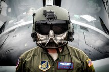 U.S. Air Force Tech. Sgt. David Jacob, 459th Airlift Squadron special mission aviator, stands in front of a UH-1N Iroquois during the 43rd Anniversary Event of Japan Ground Self-Defense Force Camp Tachikawa at JGSDF Camp Tachikawa, Japan, Oct. 1, 2016.  JGSDF UH-1Js assigned to Eastern Army Helicopter demonstrated formation flight, hoist demonstrate and disaster relief demonstration with first responders. Service members with the 459th Airlift Squadron from Yokota Air Base and Army Aviation Battalion from Camp Zama participated in the festival. (U.S. Air Force photo by Yasuo Osakabe/Released) 