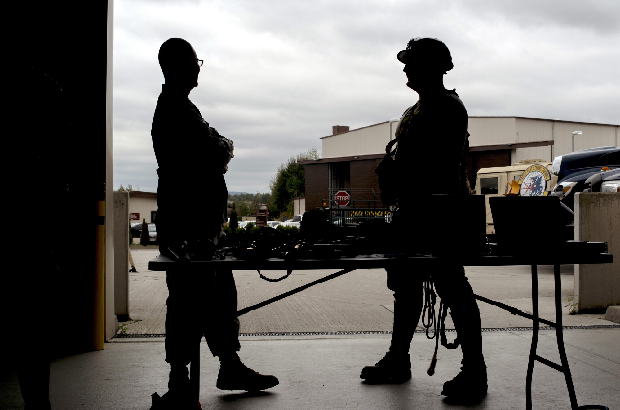 From left, Lt. Col. Mark Roman, 1st Communications Maintenance Squadron commander, and Senior Airman Cody Harman, 1st CMXS theater communication maintenance technician, stand at their squadron’s booth during the 435th Air Ground Operations Wing’s open house at Ramstein Air Base, Germany, Oct. 6, 2016. The open house provided a venue for the 435th AGOW units to showcase their equipment and capabilities. (U.S. Air Force photo by Senior Airman Tryphena Mayhugh)
