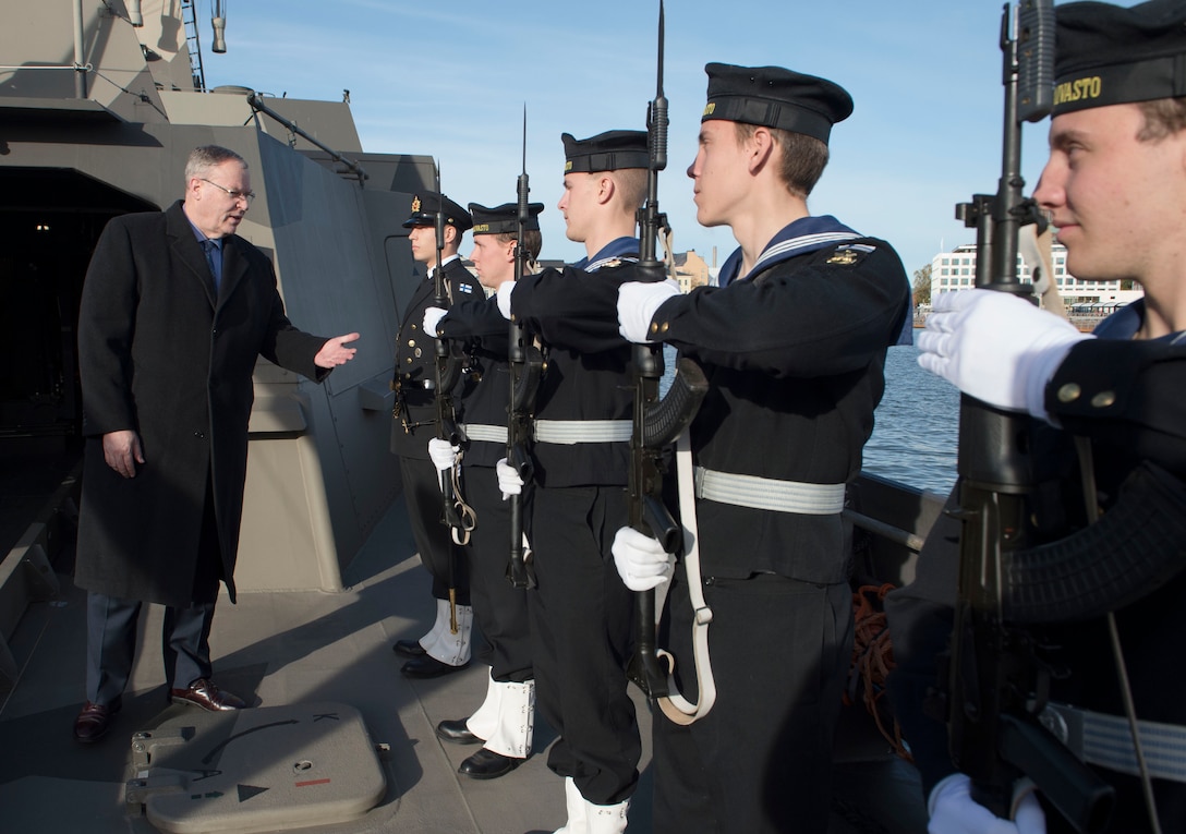 Deputy Defense Secretary Bob Work greets Finnish sailors before observing a military exercise in Helsinki, Oct. 6, 2016. DoD photo by Navy Petty Officer 1st Class Tim D. Godbee