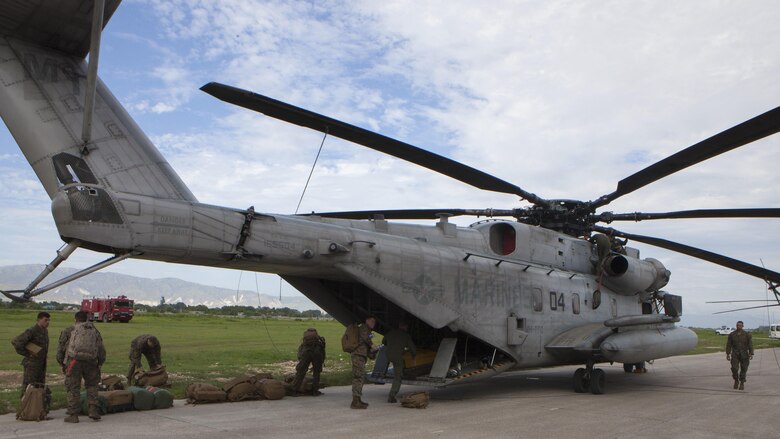 U.S. Marines with Special Purpose Marine Air-Ground Task Force – Southern Command and soldiers from Joint Task Force-Bravo’s 1st Battalion, 228th Aviation Regiment arrive by CH-53E Super Stallion, CH-47 Chinook, and UH-60L Black Hawk helicopters at Port-au-Prince, Haiti, Oct. 6, 2016. These vertical take-off assets will prove critical in gaining access to areas that are otherwise unreachable due to Hurricane Matthew. The Marines and soldiers are a part of Joint Task Force Matthew, a U.S. Southern Command-directed team deployed to Port-au-Prince at the request of the Government of Haiti, on a mission to provide humanitarian and disaster relief assistance in the aftermath of Hurricane Matthew.