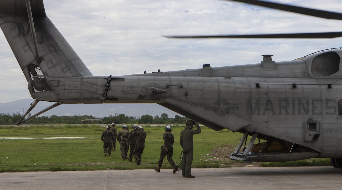 U.S. Marines with Special Purpose Marine Air-Ground Task Force – Southern Command and soldiers from Joint Task Force-Bravo’s 1st Battalion, 228th Aviation Regiment arrive by CH-53E Super Stallion, CH-47 Chinook, and UH-60L Black Hawk helicopters at Port-au-Prince, Haiti, Oct. 6, 2016. These vertical take-off assets will prove critical in gaining access to areas that are otherwise unreachable due to Hurricane Matthew. The Marines and soldiers are a part of Joint Task Force Matthew, a U.S. Southern Command-directed team deployed to Port-au-Prince at the request of the Government of Haiti, on a mission to provide humanitarian and disaster relief assistance in the aftermath of Hurricane Matthew.