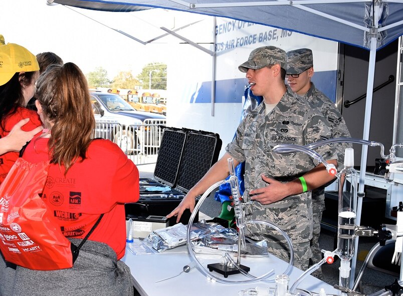 Senior Airman Nickolas Candiano, 14th Civil Engineer Squadron, shows students their common equipment during the Create Foundation career exposition Oct. 4 at the BancorpSouth Arena and Conference Center in Tupelo, Mississippi. Students from seventeen northeast Mississippi counties attended the event giving them the opportunity to take the first look at their future. (U.S. Air Force photo by Elizabeth Owens)