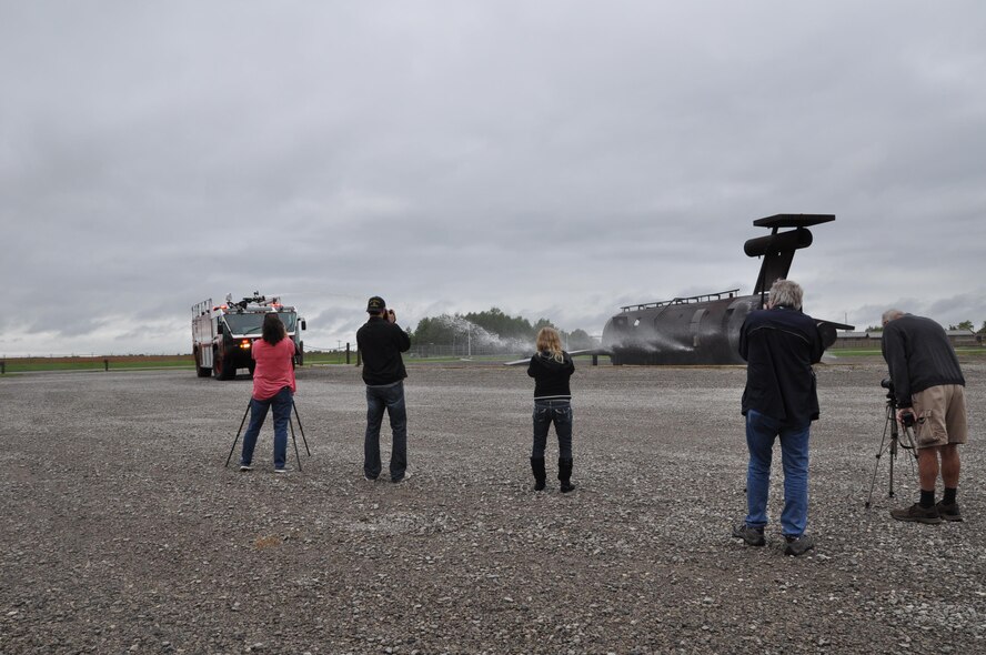 The 910th Civil Engineer Squadron fire department demonstrates the water cannon on one of the crash trucks for a group of photographers participating in Scott Kelby’s Worldwide Photowalk on Oct. 1, 2016 here. Seven photographers from eastern Ohio and western Pennsylvania participated in the walk at YARS. The group spent time on station photographing fire department trucks, equipment and personnel. They ended their visit with lunch at the Community Activity Center. According to the walk website, the walk is a social photography event where photographers get together to walk around, shoot photos and have fun with other photographers. (U.S. Air Force photo/Maj. Polly Orcutt)