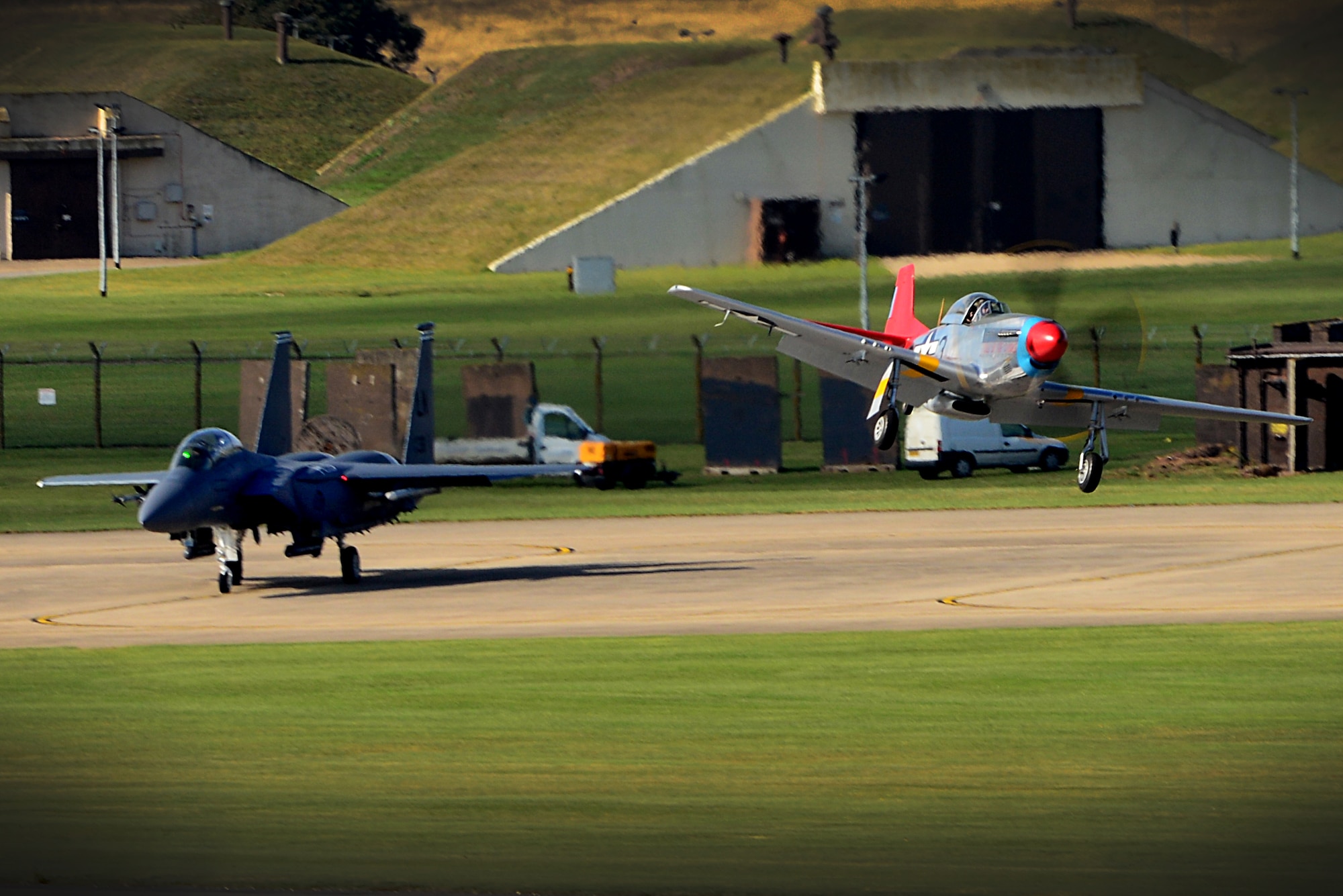 A World War II era P-51D Mustang makes its landing approach at Royal Air Force Lakenheath, England, Oct. 4, 2016. The aircraft, known as a Red Tail, was reunited with its former Tuskegee Airman pilot, U.S. Air Force retired Lt. Col. George E. Hardy. (U.S. Air Force photo/ Tech. Sgt. Matthew Plew)