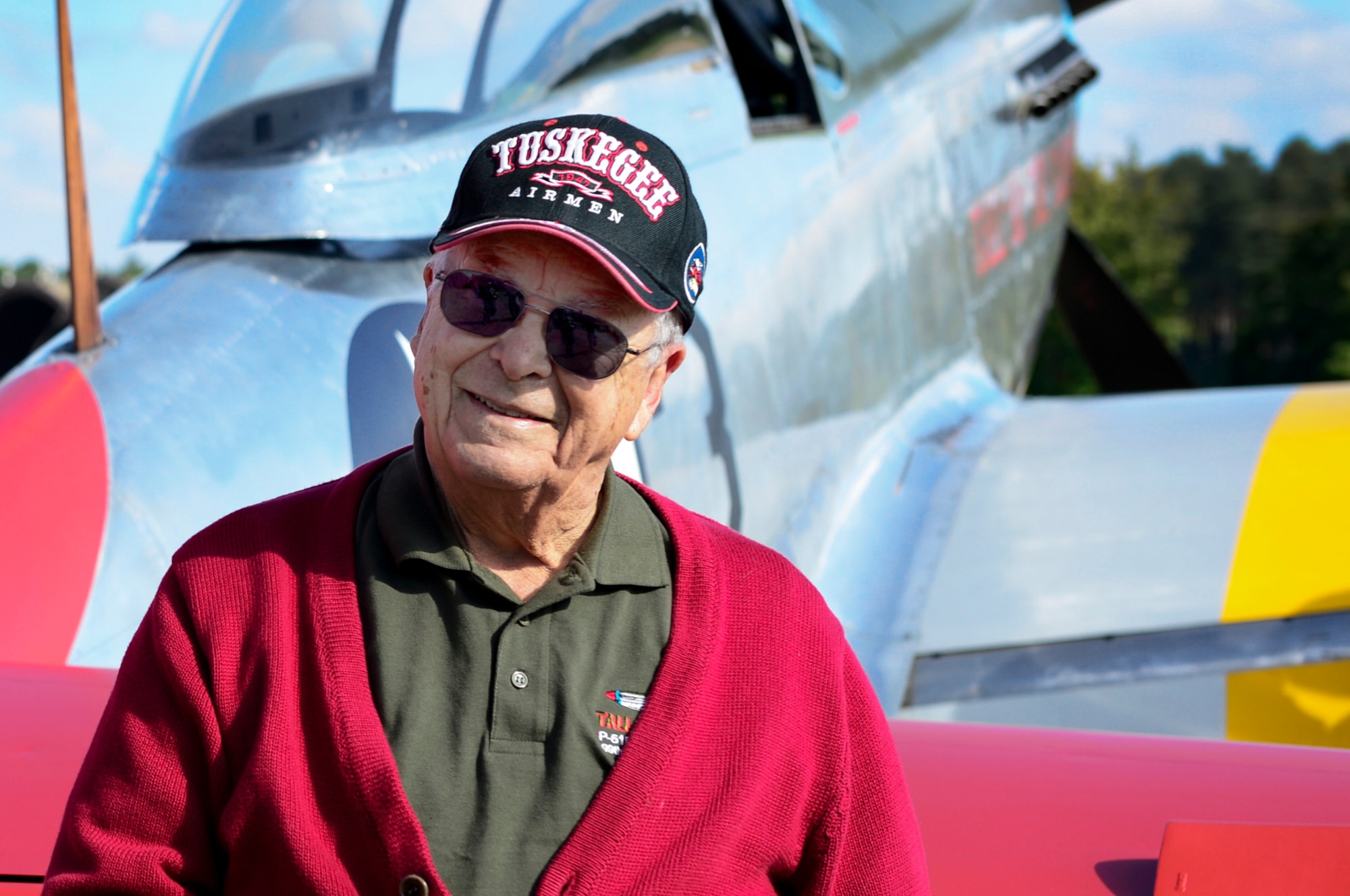 U.S. Air Force retired Lt. Col. George E. Hardy, a Tuskegee Airman, stands next to his former P-51D Mustang at Royal Air Force Lakenheath, England, Oct. 4, 2016. The Tuskegee Airmenwere an all African-American fighter group during World War II and consisted of more than 900 pilots who maintained and flew combat missions while overseas.  (U.S. Air Force photo/ Senior Airman Malcolm Mayfield)