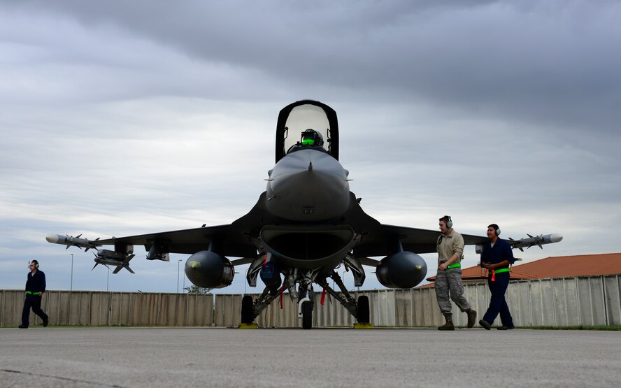 Airmen from the 31st Aircraft Maintenance Squadron Fighting Falcon perform an end-of-flight inspection on an F-16 at Aviano Air Base, Italy on Oct. 5, 2016. Airmen from the 31st AMXS inspect aircraft for physical, electrical and environmental defects to ensure the aircraft stays mission ready. (U.S. Air Force photo by Senior Airman Krystal Ardrey/Released)