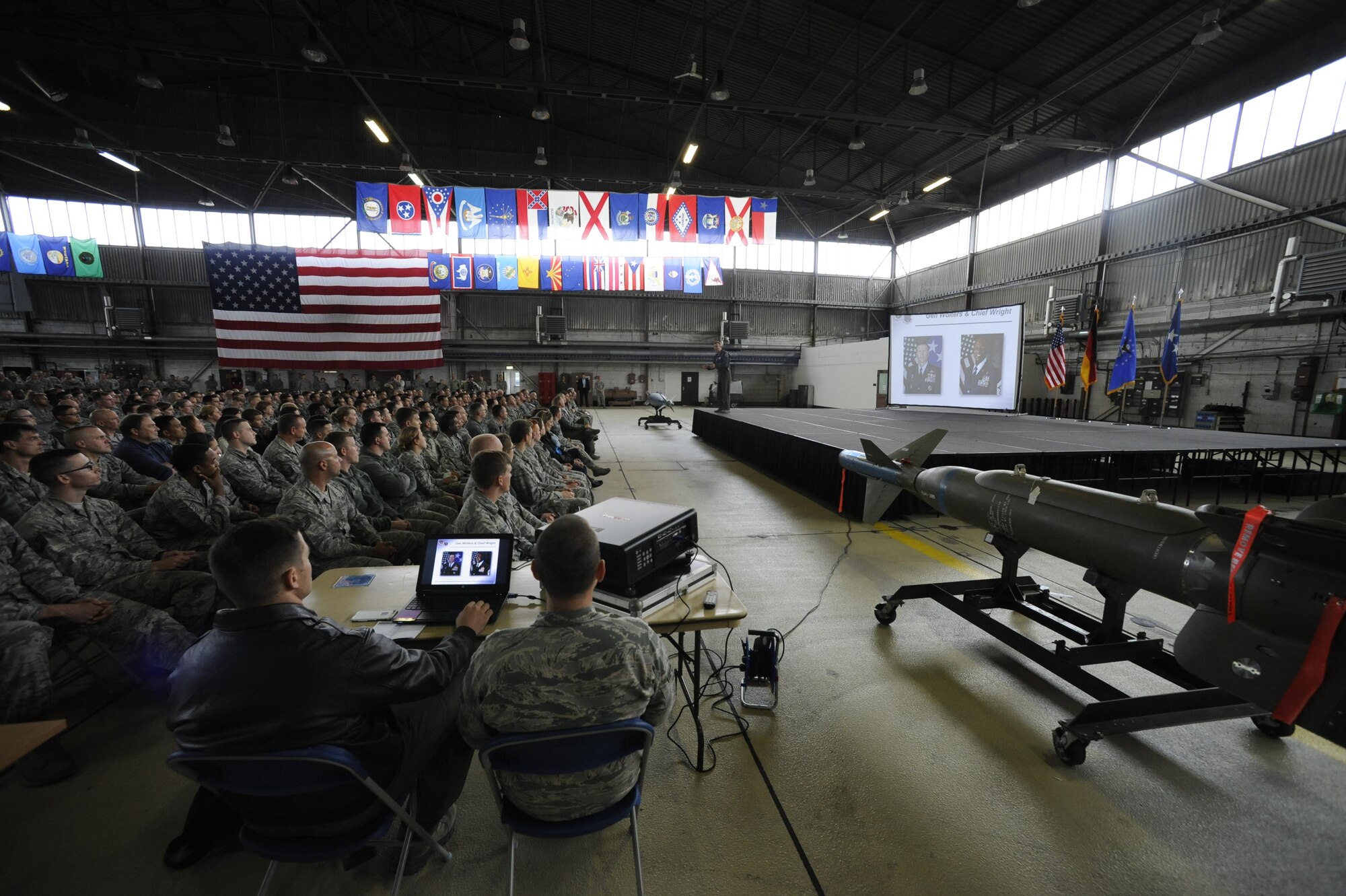 Gen. Tod D. Wolters, U.S. Air Forces in Europe and Air Forces Africa commander, speaks to 52nd Fighter Wing Airmen during an all call in Hanger One on Spangdahlem Air Base, Germany, Oct. 6, 2016. Wolters made his first visit to Spangdahlem since assuming command in August 2016, speaking to Airmen and introducing himself as the new commander. (U.S. Air Force photo by Senior Airman Joshua R. M. Dewberry)