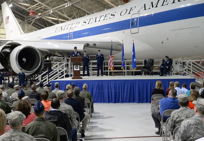 U.S. Air Force Maj. Gen. Thomas Bussiere, Eighth Air Force commander, left, introduces Col. Robert Billings as the new 595th Command and Control Group commander during the E-4B transfer ceremony at Offutt Air Force Base, Neb., Oct. 7, 2016. The 595th CACG stood up as part of a larger effort to centralize management of nuclear assets under Air Force Global Strike Command. (U.S. Air Force photo by )