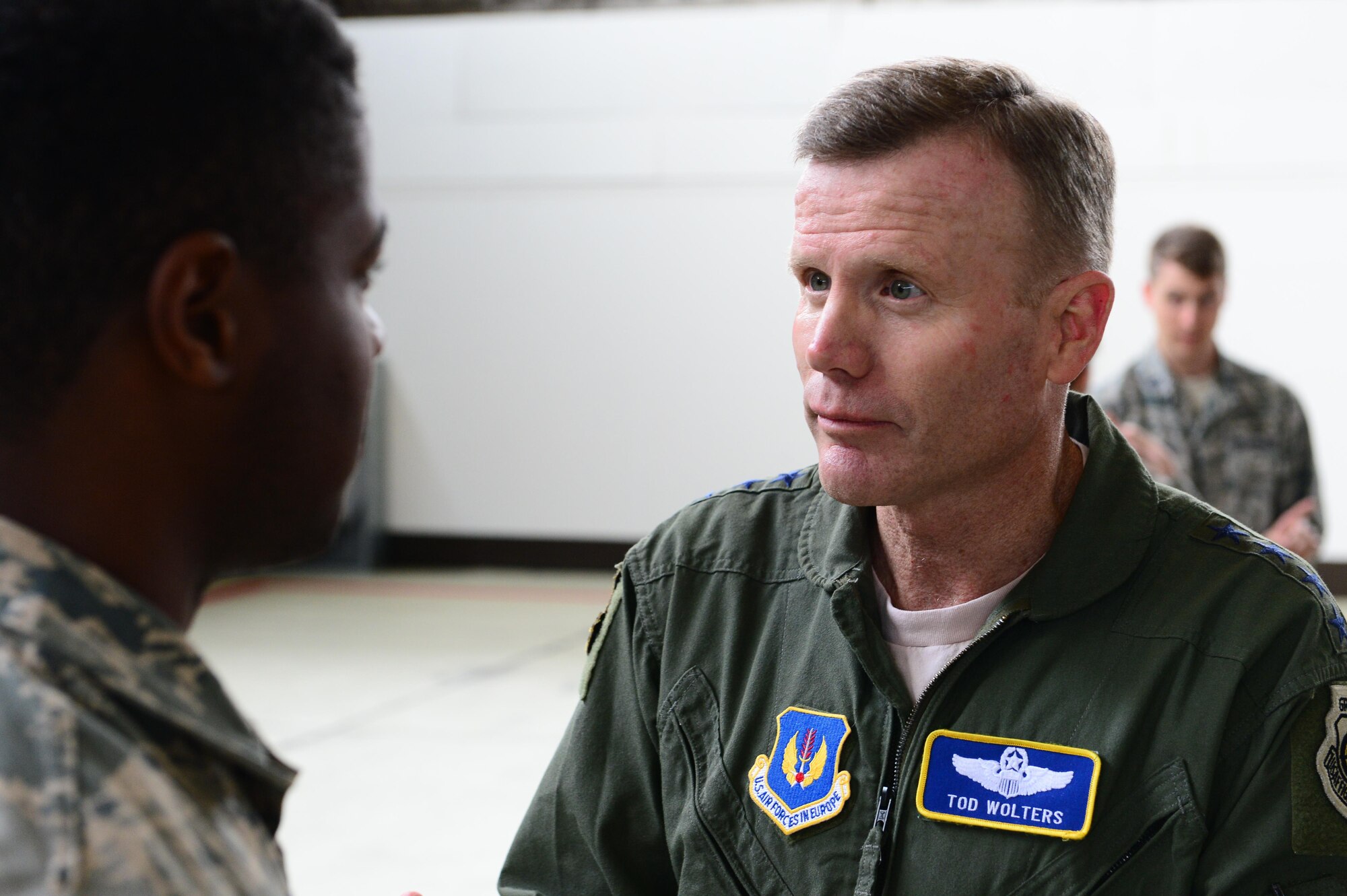 Gen. Tod D. Wolters, U.S. Air Forces in Europe and Air Forces Africa commander, interacts with Airmen after an all call at Hanger One on Spangdahlem Air Base, Germany, Oct. 6, 2016. Wolters made his first visit to Spangdahlem since assuming command in August 2016, speaking to Airmen on the importance their missions and introducing himself as the new commander. (U.S. Air Force photo by Senior Airman Joshua R. M. Dewberry)