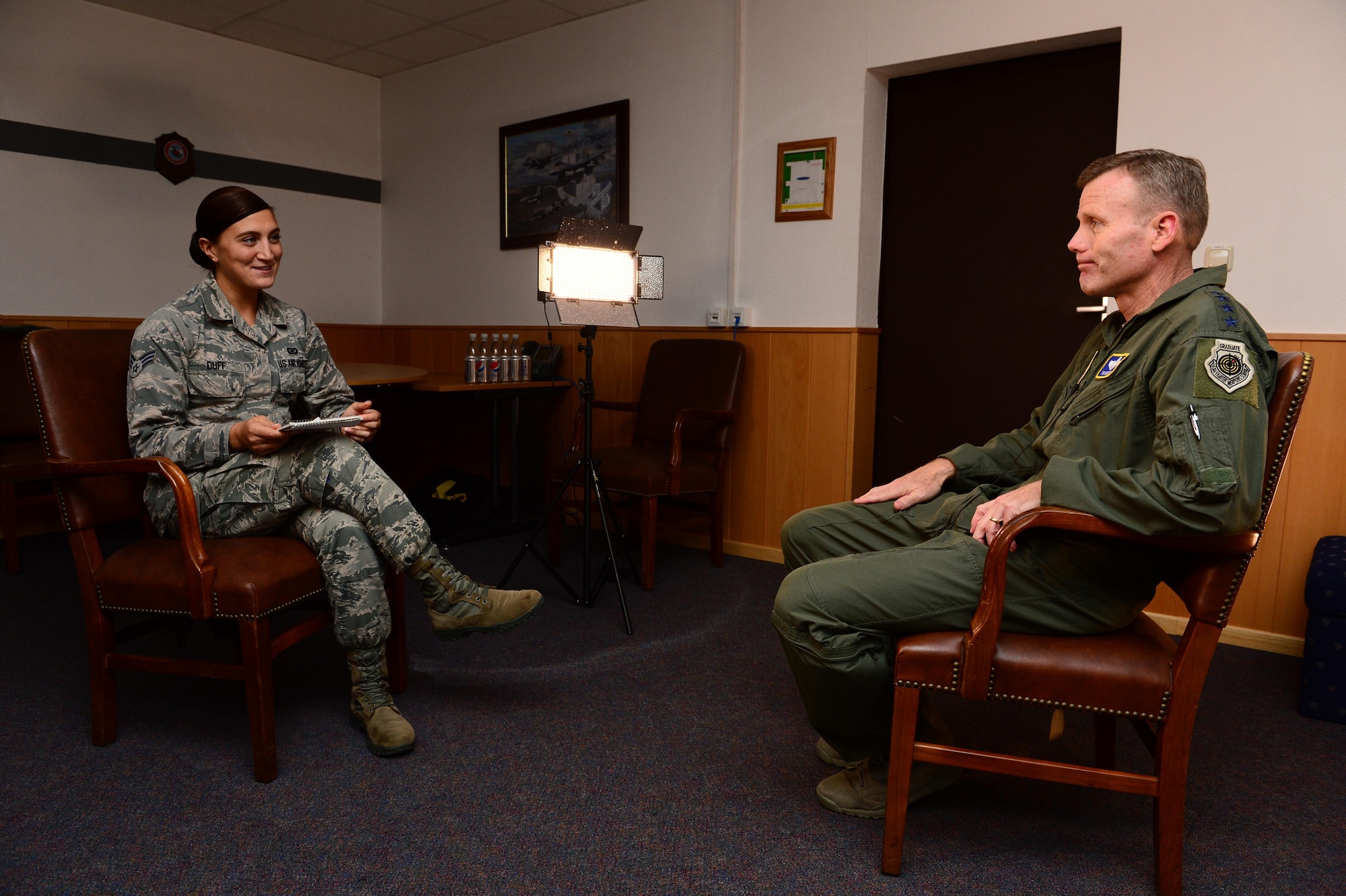 Gen. Tod D. Wolters, U.S. Air Forces in Europe and Air Forces Africa commander, right, listens to a question by Senior Airman Emma Duff, American Forces Network broadcaster, left, during his visit to Spangdahlem Air Base, Germany, Oct. 6, 2016. Wolters made his first visit to Spangdahlem since assuming command in August 2016, speaking to Airmen on the importance and uniqueness of their mission priorities. (U.S. Air Force photo by Senior Airman Joshua R. M. Dewberry)