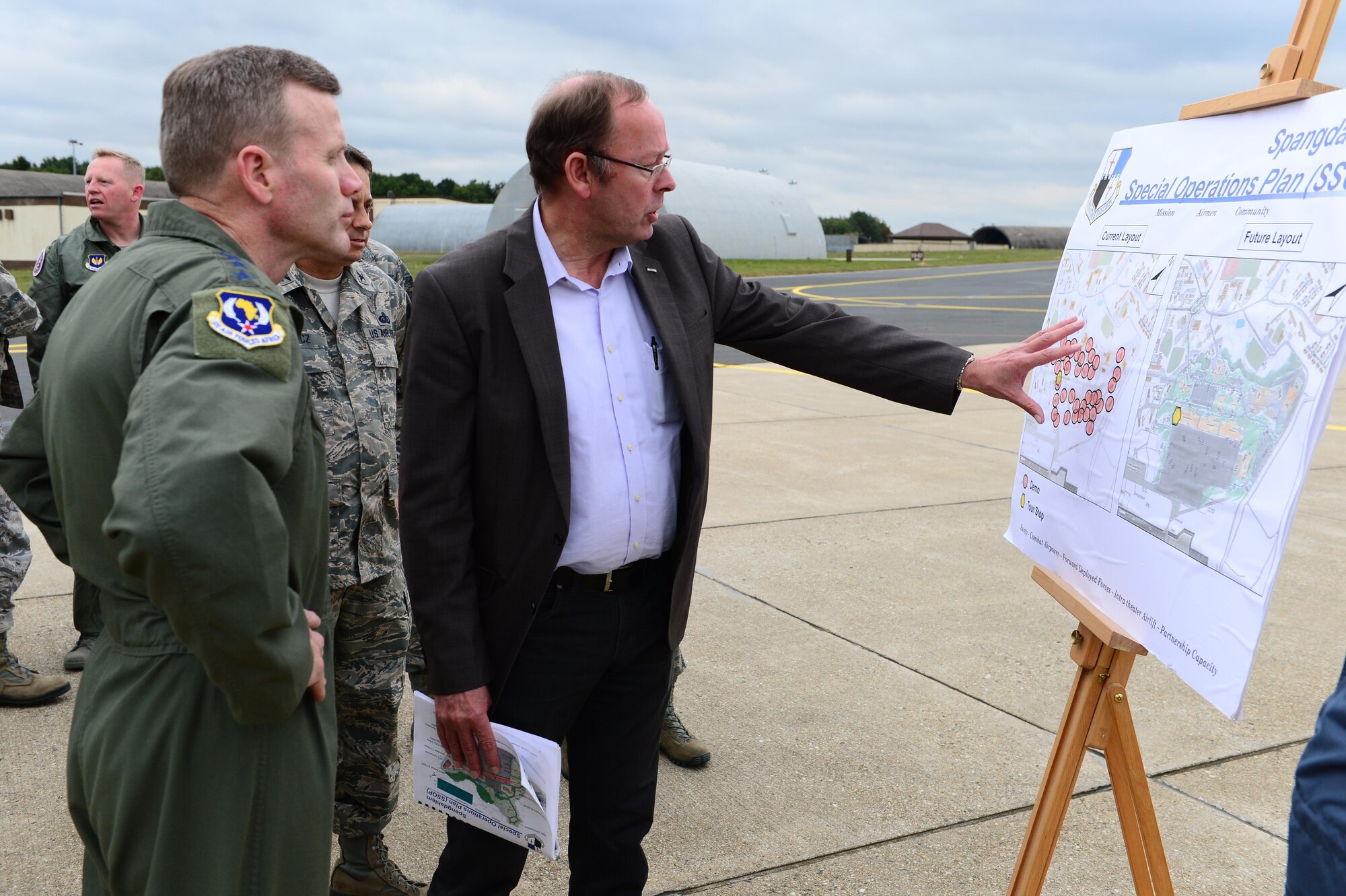 Gen. Tod D. Wolters, U.S. Air Forces in Europe and Air Forces Africa commander, left, receives a brief on constructional development while visiting Spangdahlem Air Base, Germany, Oct. 6, 2016. Wolters made his first visit to Spangdahlem since assuming command in August 2016, speaking to Airmen on the importance and uniqueness of their mission priorities. (U.S. Air Force photo by Senior Airman Joshua R. M. Dewberry)