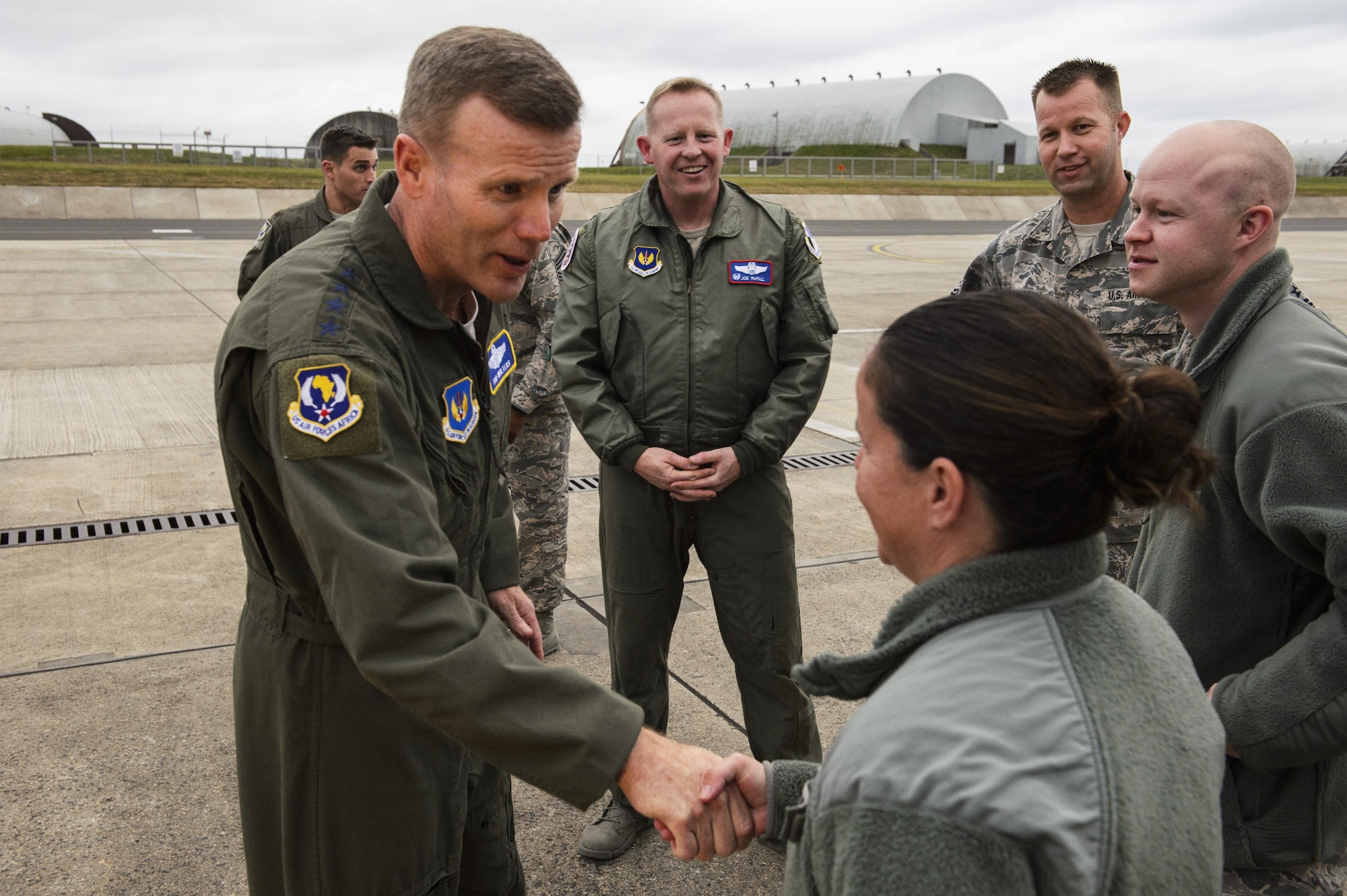 Gen. Tod D. Wolters, U.S. Air Forces in Europe and Air Forces Africa commander, coins Airmen while visiting Spangdahlem Air Base, Germany, Oct. 6, 2016. Wolters made his first visit to Spangdahlem since assuming command in August 2016, speaking to Airmen on the importance and uniqueness of their mission priorities. (U.S. Air Force photo by Senior Airman Joshua R. M. Dewberry)