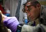 Col. (Dr.) Chad Hivnor, laser and research chief with the 59th Medical Specialty Squadron, uses a fractional carbon dioxide laser to treat a patient’s scar at the Wilford Hall Ambulatory Surgical Center on Joint Base San Antonio-Lackland, Texas, Oct. 7. The laser treatment, also known as fractional skin resurfacing, goes deep into the epidermis of the skin and stimulates the production of collagen to create firm and smooth skin. Hivnor recently earned the San Antonio Business Journal 2016 Health Care Hero award for his contributions to health care in the local community. (U.S. Air Force photo/Staff Sgt. Kevin Iinuma) 