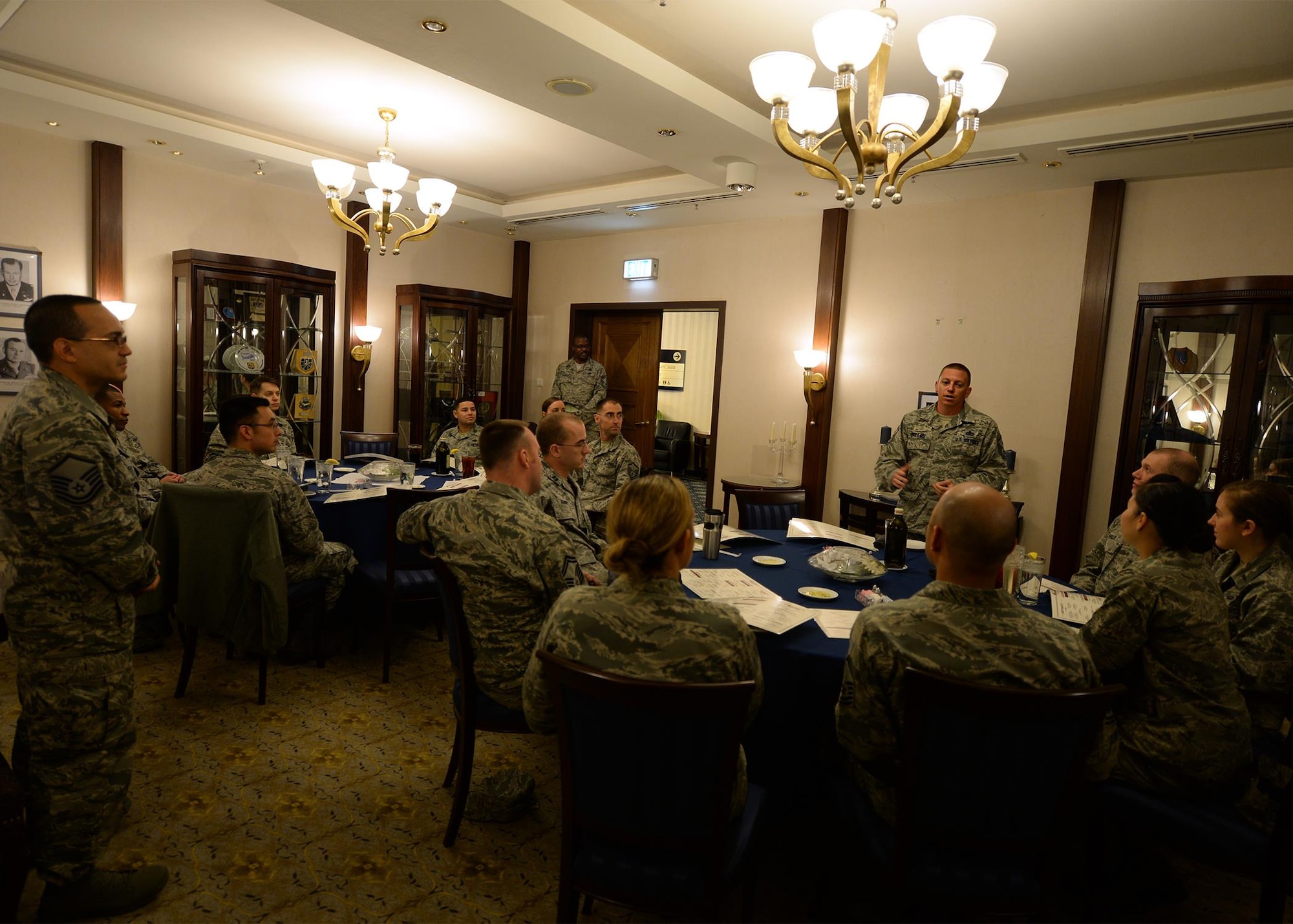 Senior noncommissioned officers and company grade officers share discussion topics during a mentoring luncheon at Ramstein Air Base, Germany, Oct. 5, 2016. The luncheon provided SNCOs the opportunity to mentor company grade officers on enlisted career progression and enlist performance reports. (U.S. Air Force photo by Senior Airman Jimmie D. Pike)