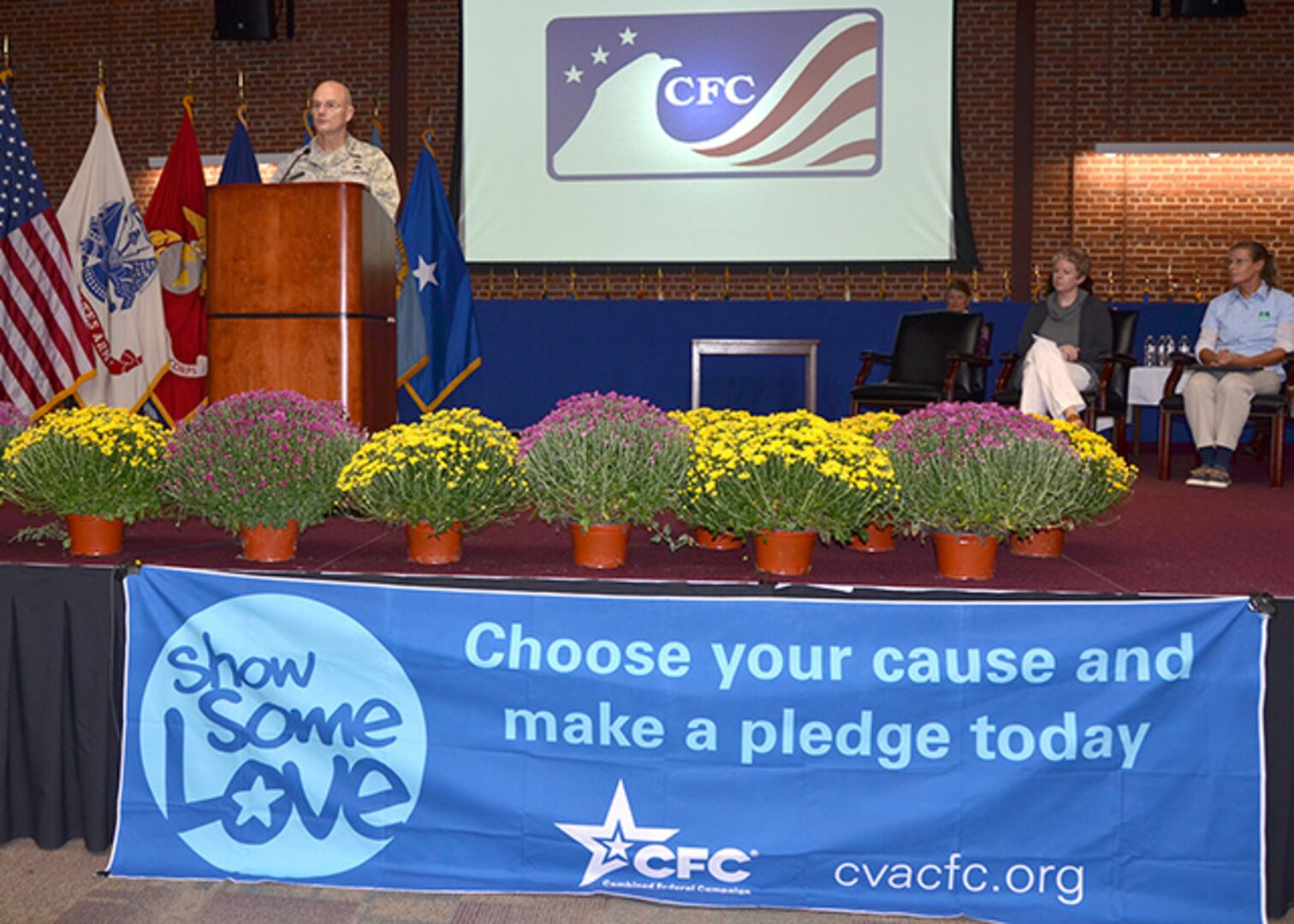 Defense Logistics Agency Aviation's Commander Air Force Brig. Gen. Allan Day gives opening remarks during the annual Combined Federal Campaign kick off, Oct. 4, 2016 in the Lott's Conference Center on Defense Supply Center Richmond, Virginia. The theme for the 2016 campaign is "show some love."