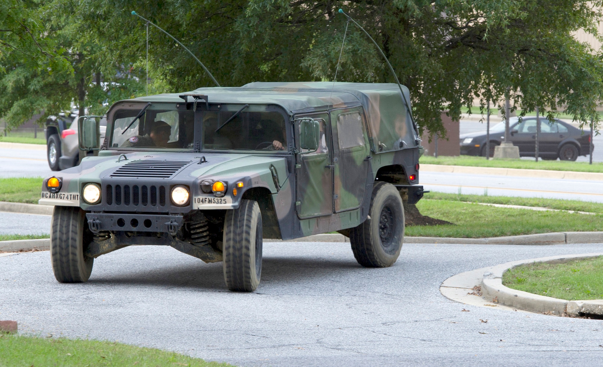Kwami Penty rides in a HUMVEE as part of the “Pilot for a Day” program at Joint Base Andrews, Md., Oct. 6, 2016. The event occurs biannually here to indulge children from Children’s National Medical Center in Washington, D.C., who are battling serious illnesses in their interest in aviation. Kwami was brought to multiple base agencies for displays, demonstrations and simulations via a HUMVEE ride. (U.S. Air Force photo by Senior Airman Jordyn Fetter)