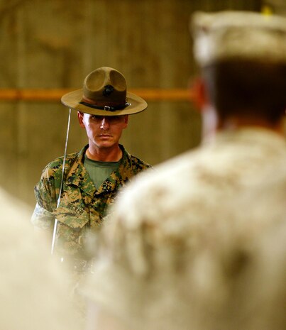 Marine Corps drill instructors, from Marine Corps Recruit Depot Parris Island, S.C., instruct recruits in physical fitness, close-order drill and other classes, while aboard Marine Corps Logistics Base Albany, Oct. 6.