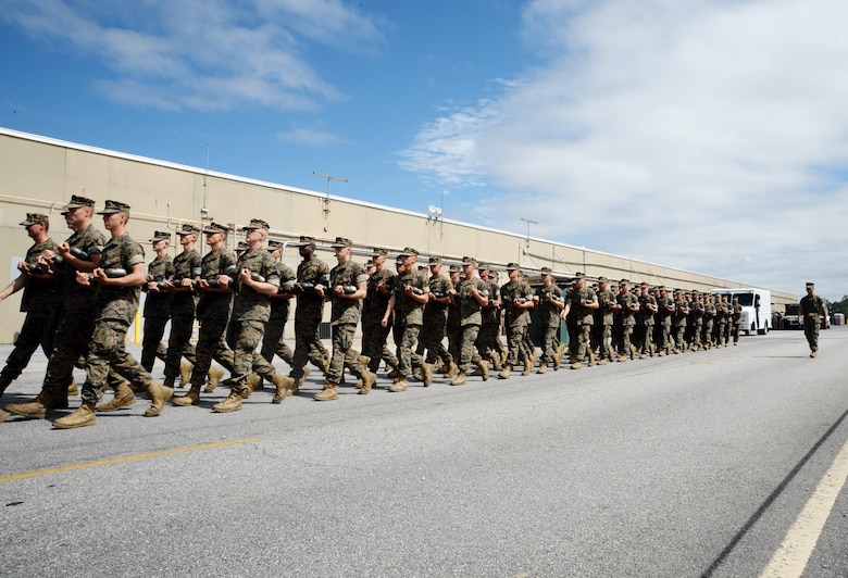A Marine Corps drill instructor from Marine Corps Recruit Depot Parris Island, S.C. marches a platoon of recruits aboard Marine Corps Logistics Base Albany, Oct. 6.