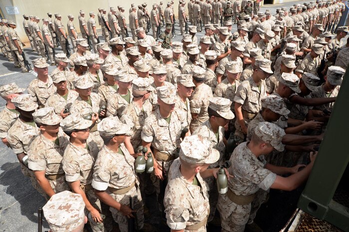 Marine recruits stay hydrated by filling their canteens with water aboard Marine Corps Logistics Base Albany, Oct. 6.