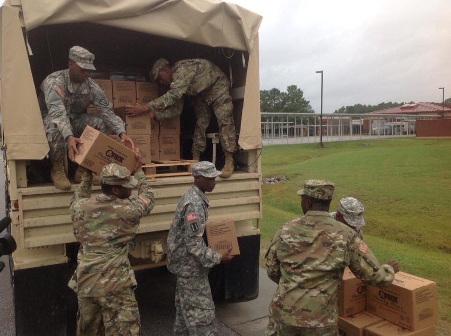 South Carolina National Guard Soldiers with the 1053rd Transportation Company deliver meals ready to eat to the emergency shelter at Westview Middle School, Goose Creek, S.C., Oct. 7, 2016, in advance of Hurricane Matthew. Multiple shelters have been established in the low country to assist citizens affected by the storm.