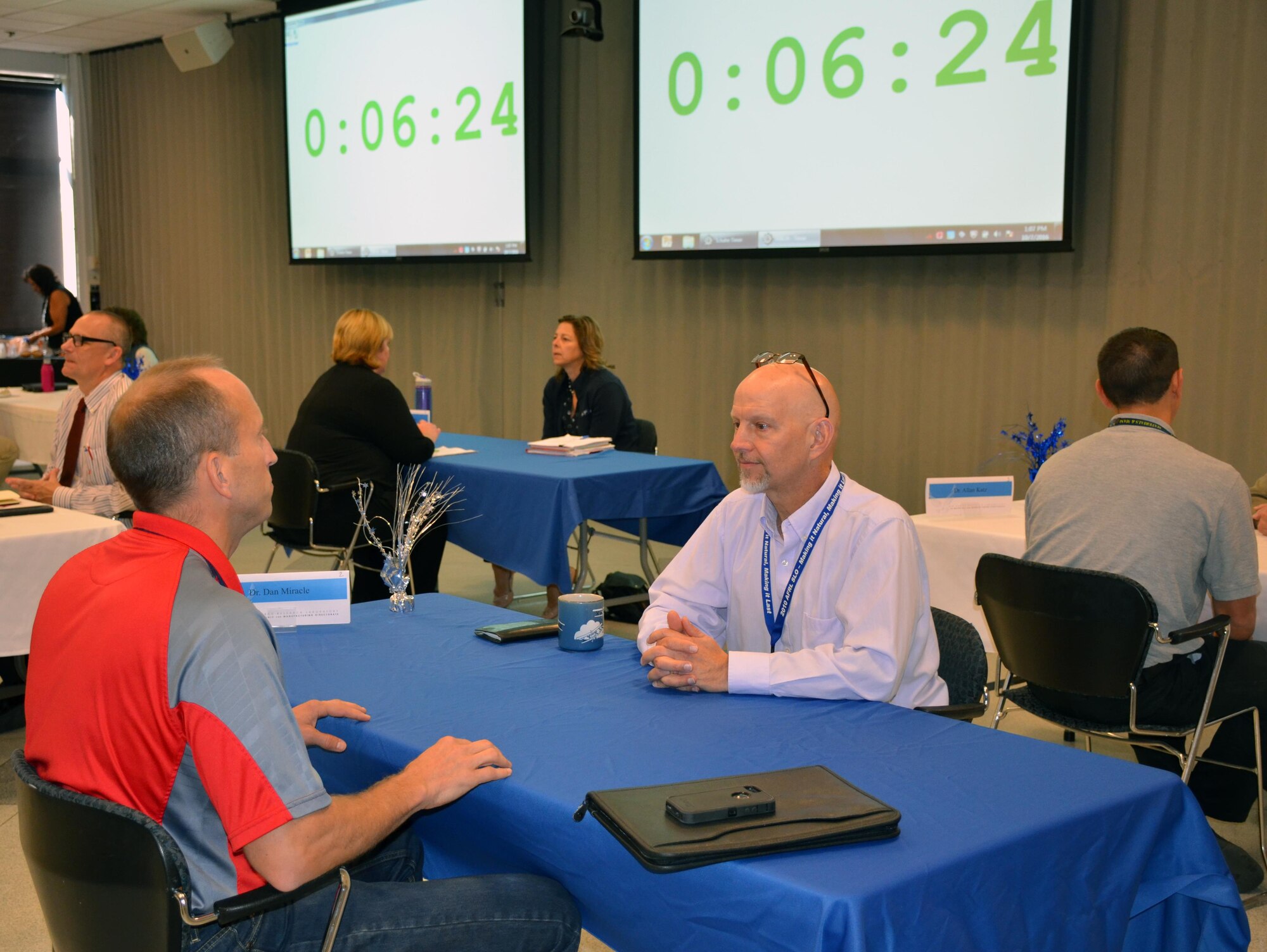 Dr. Dan Miracle, a senior scientist at the Materials and Manufacturing Directorate, Air Force Research Laboratory, meets with potential future mentee, Mark Walker (left) during a Speed Mentoring session, Oct. 7. The directorate’s inaugural “speed mentoring” event took concepts from “speed dating” to help match mentors and future mentees for a year-long career enlightening opportunity. (U.S. Air Force photo by Marisa Alia-Novobilski/released)