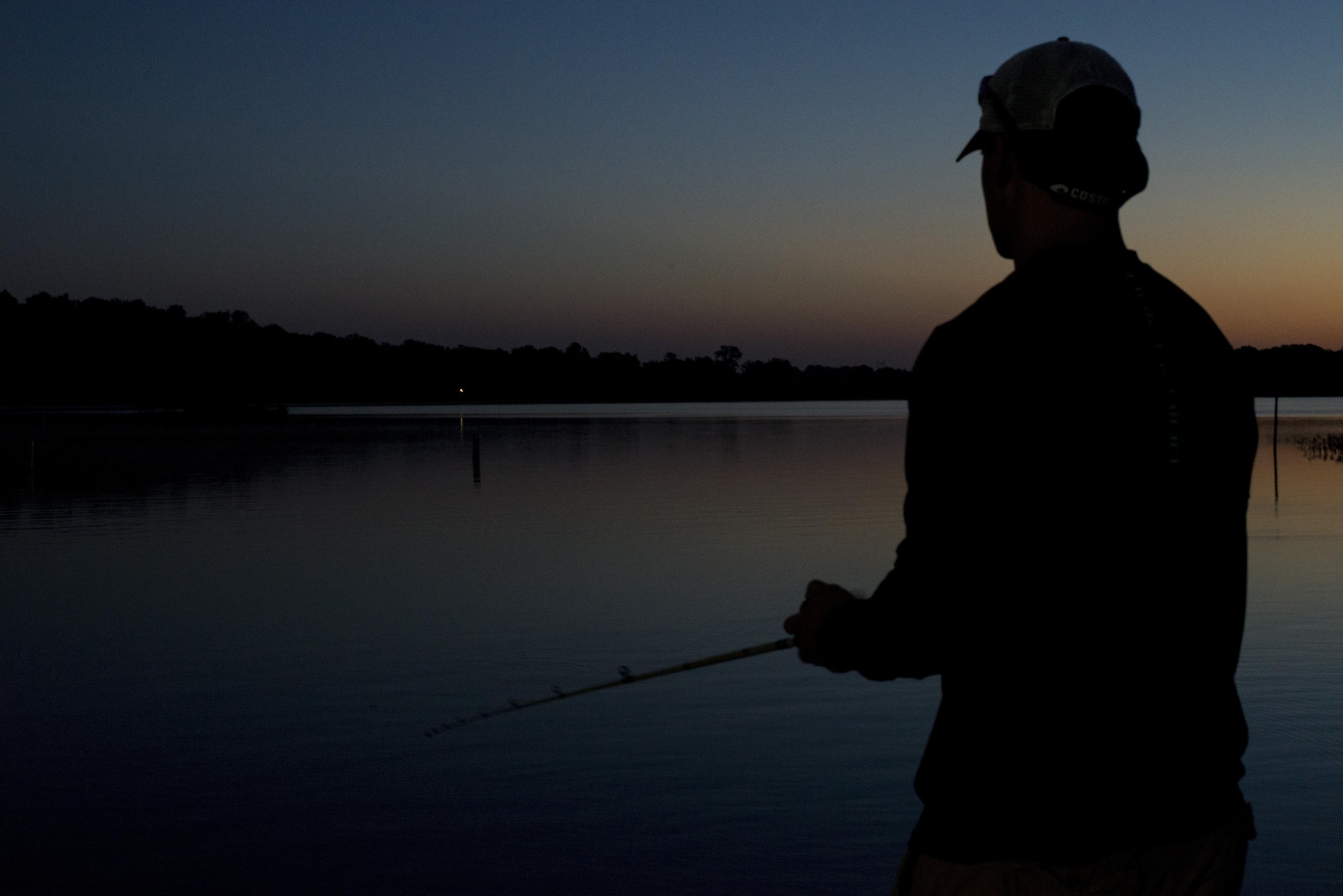 Staff Sgt. Alex Stojadinovic fishes on the Alabama River, Sept. 29, 2016. The Holm Center finance troop uses fished as an outlet to keep his mind calm. (U.S. Air Force photo by Senior Airman William Blankenship)