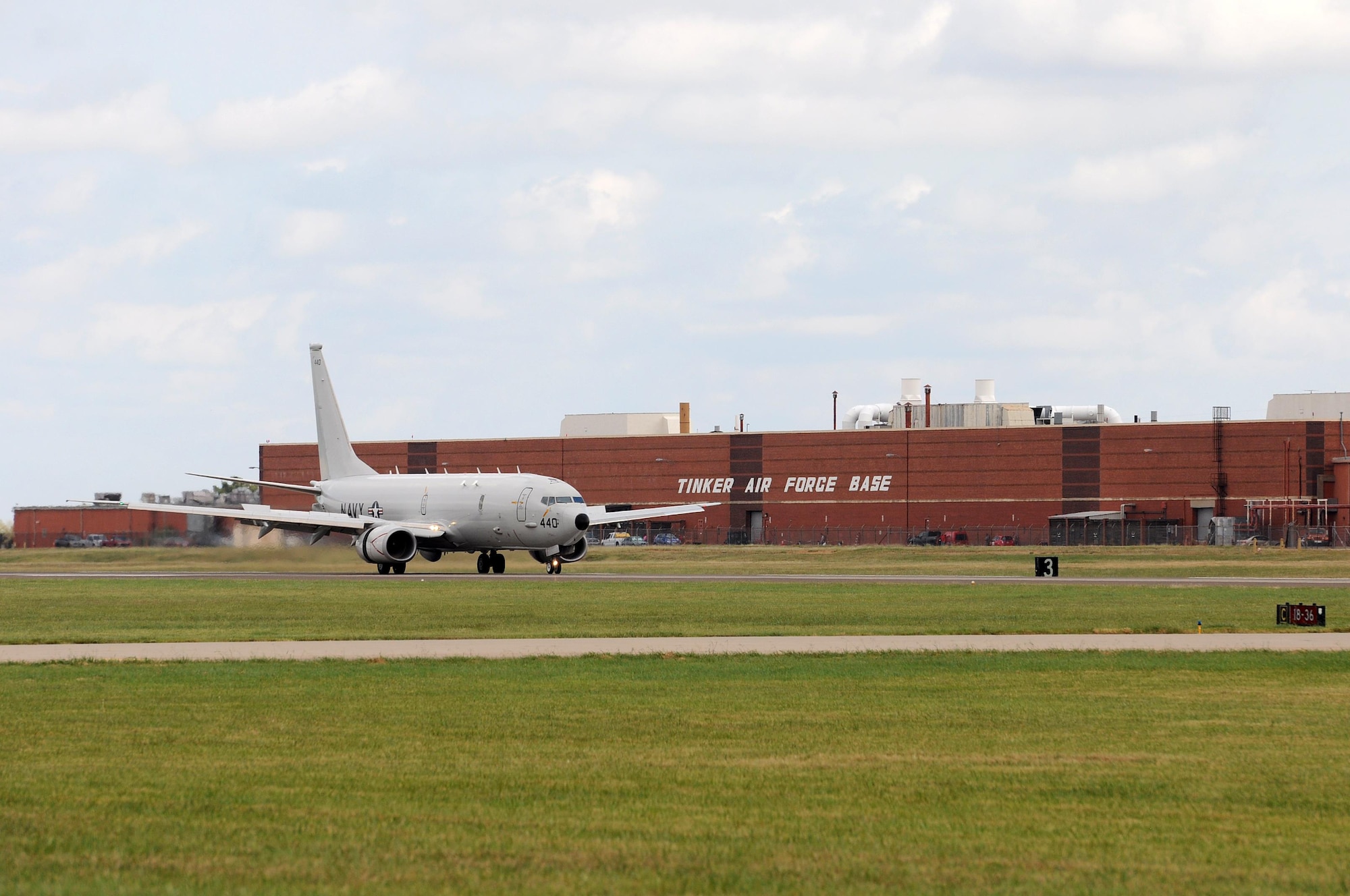 One of eight Navy P-8 Poseidons seeking shelter from the storm touches down at Tinker Air Force Base, Oklahoma, Oct. 6. Eleven aircraft left Naval Air Station Jacksonville, Florida, for Tinker ahead of Hurricane Matthew’s arrival on the East Coast. (Air Force photo by April McDonald)