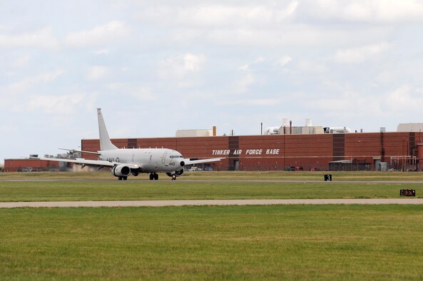 One of eight Navy P-8 Poseidons seeking shelter from the storm touches down at Tinker Air Force Base, Oklahoma, Oct. 6. Eleven aircraft left Naval Air Station Jacksonville, Florida, for Tinker ahead of Hurricane Matthew’s arrival on the East Coast. (Air Force photo by April McDonald)