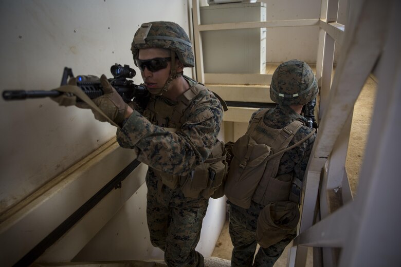 MARINE CORPS BASE HAWAII – Marines from Alpha Company, 1st Battalion, 3rd Marine Regiment, practice clearing buildings during Exercise Island Viper aboard Marine Corps Base Hawaii, Sept. 28, 2016. Marines wrap up their final week of Exercise Island Viper, an annual pre-deployment training event preparing Marines for a larger exercise in the Pacific Region. During Exercise Island Viper, the Marines practiced clearing buildings, patrolling through simulated villages, solved obstacles at the Leadership Reaction Course and traversing through an Improvising Explosive Devices course. (U.S. Marine Corps Photo by Lance Cpl. Jesus Sepulveda Torres)