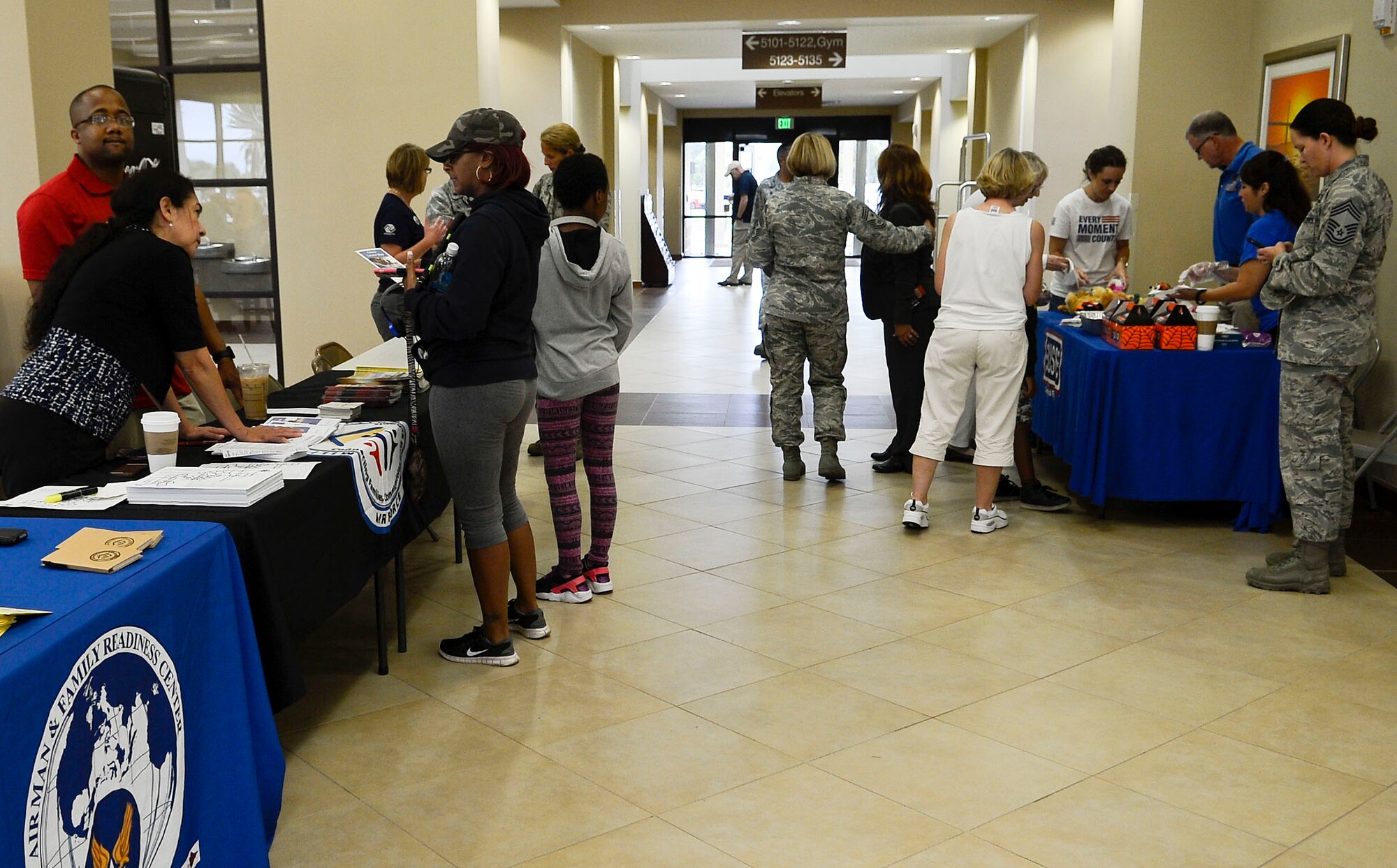 Members of the 6th Force Support Squadron and the United Services Organizations provide assistance to Hurricane Matthew evacuees Oct. 7, 2016, at MacDill Air Force Base, Fla. More than 150 evacuees traveled through MacDill’s gates seeking refuge at the MacDill Inn. (U.S. Air Force photo by Senior Airman Jenay Randolph)   