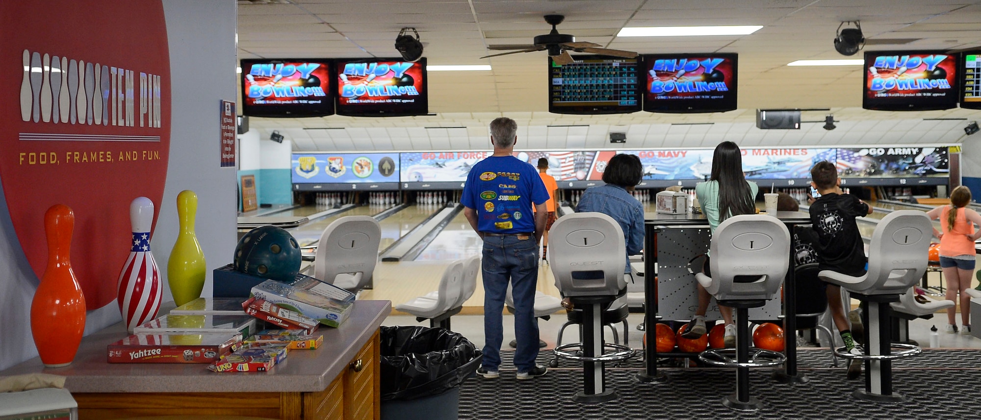 Hurricane Matthew evacuees enjoy free bowling at MacDill Bowling Lanes, Oct. 7, 2016, at MacDill Air Force Base, Fla. Along with free shoes and games, MacDill Bowling Lanes offered games and family activities for the evacuees. (U.S Air Force photo by Senior Airman Jenay Randolph)   