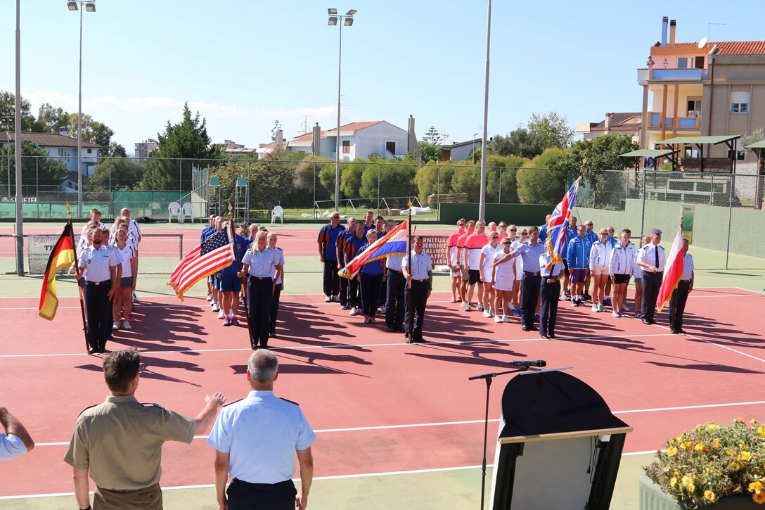 Five teams stand at attention during the opening ceremony for the Headquarters Air Command Tennis Championship 2016 Sardegna in Cagliari, Italy Sept. 19. NATO countries compete every two years in a variety of sports. (Courtesy photo)