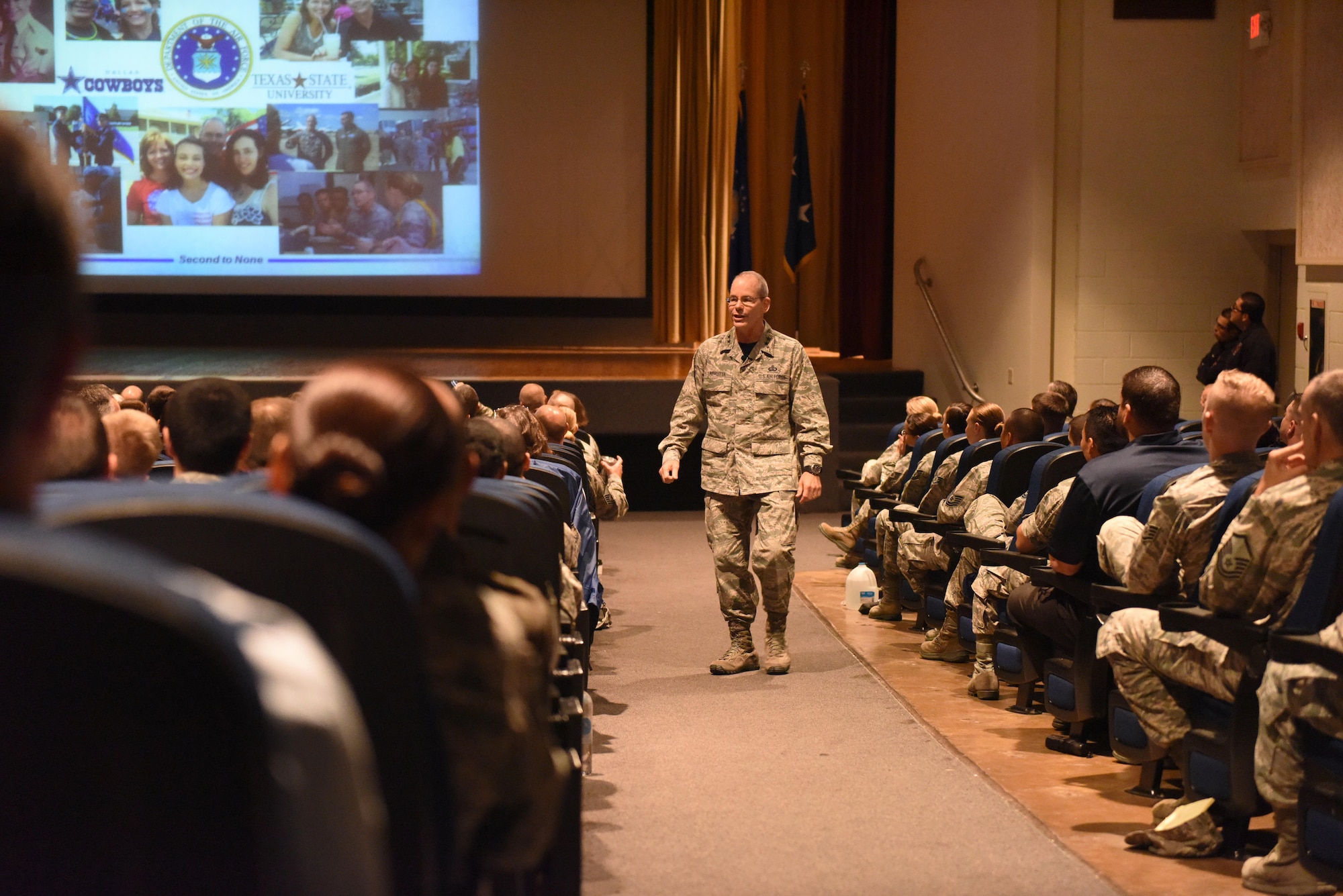 U.S. Air Force Maj. Gen. Bob LaBrutta, 2nd Air Force Commander, speaks during a commander's call at the base theater on Goodfellow Air Force Base, Texas, Oct. 7, 2016. Among several topics, LaBrutta spoke about how the Air Force needs to work together as a team. (U.S. Air Force photo by Airman 1st Class Chase Sousa/Released)