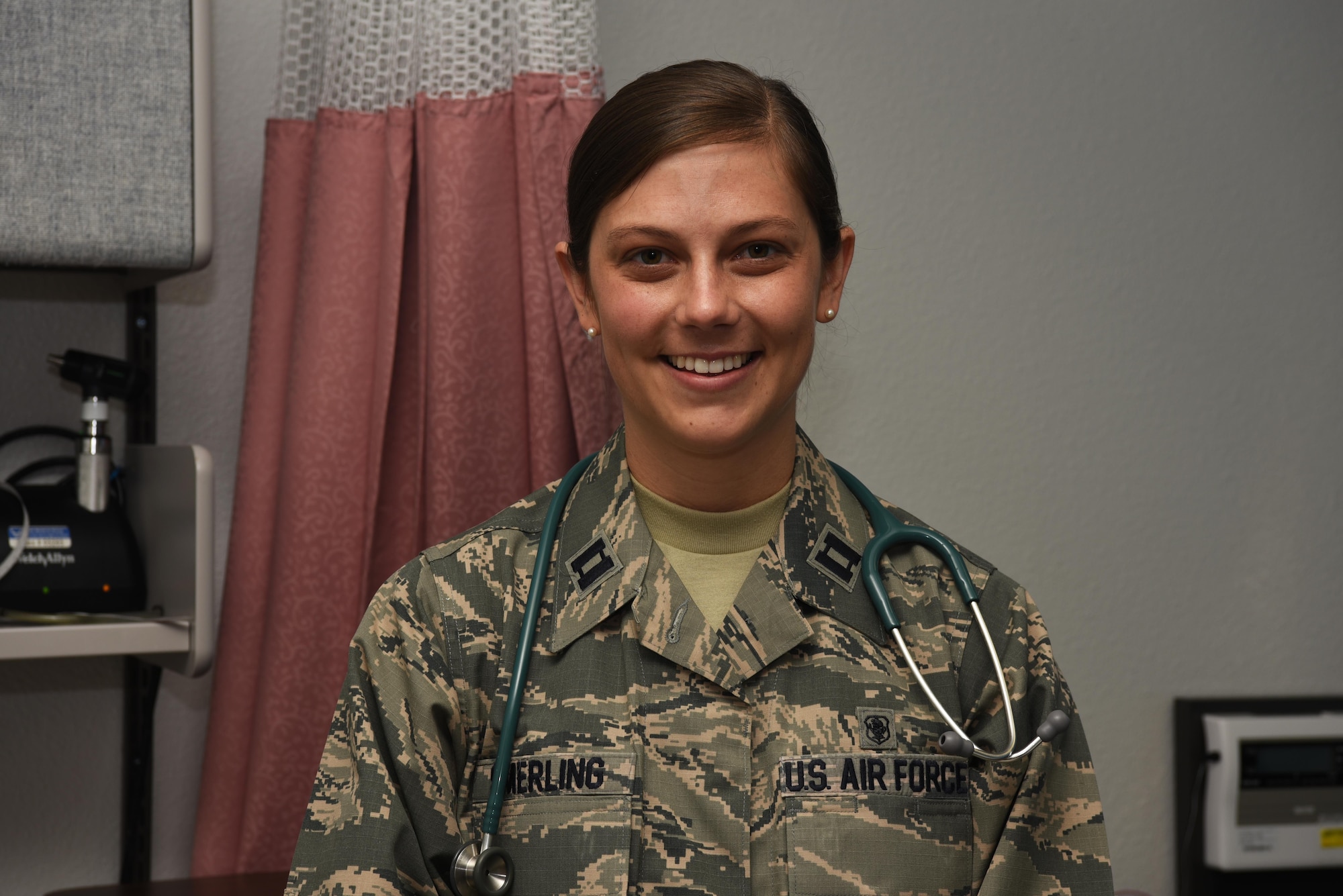 Capt. Kelly Smerling, 90th Medical Operations Squadron pediatric nurse practitioner, poses at the clinic at F.E. Warren Air Force Base, Wyo., Sept. 29, 2016. The 90th MOS mission is to provide quality and safe healthcare to active duty, dependent and veteran patients. (U.S. Air Force photo by Airman 1st Class Breanna Carter)