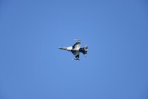 A U.S. Air Force F-16 Fighting Falcon with the 18th Aggressor Squadron flies over Eielson Air Force Base, Alaska, as it returns from a morning sortie Aug. 10, 2016, during RED FLAG-Alaska 16-3. Pilots who fly with the Aggressors apply years of flight experience and an expansive understanding of adversary tactics in order to train pilots participating in this Pacific Air Forces' commander-directed training exercise between U.S. and partner nation forces. (U.S. Air Force photo by Master Sgt. Karen J. Tomasik)