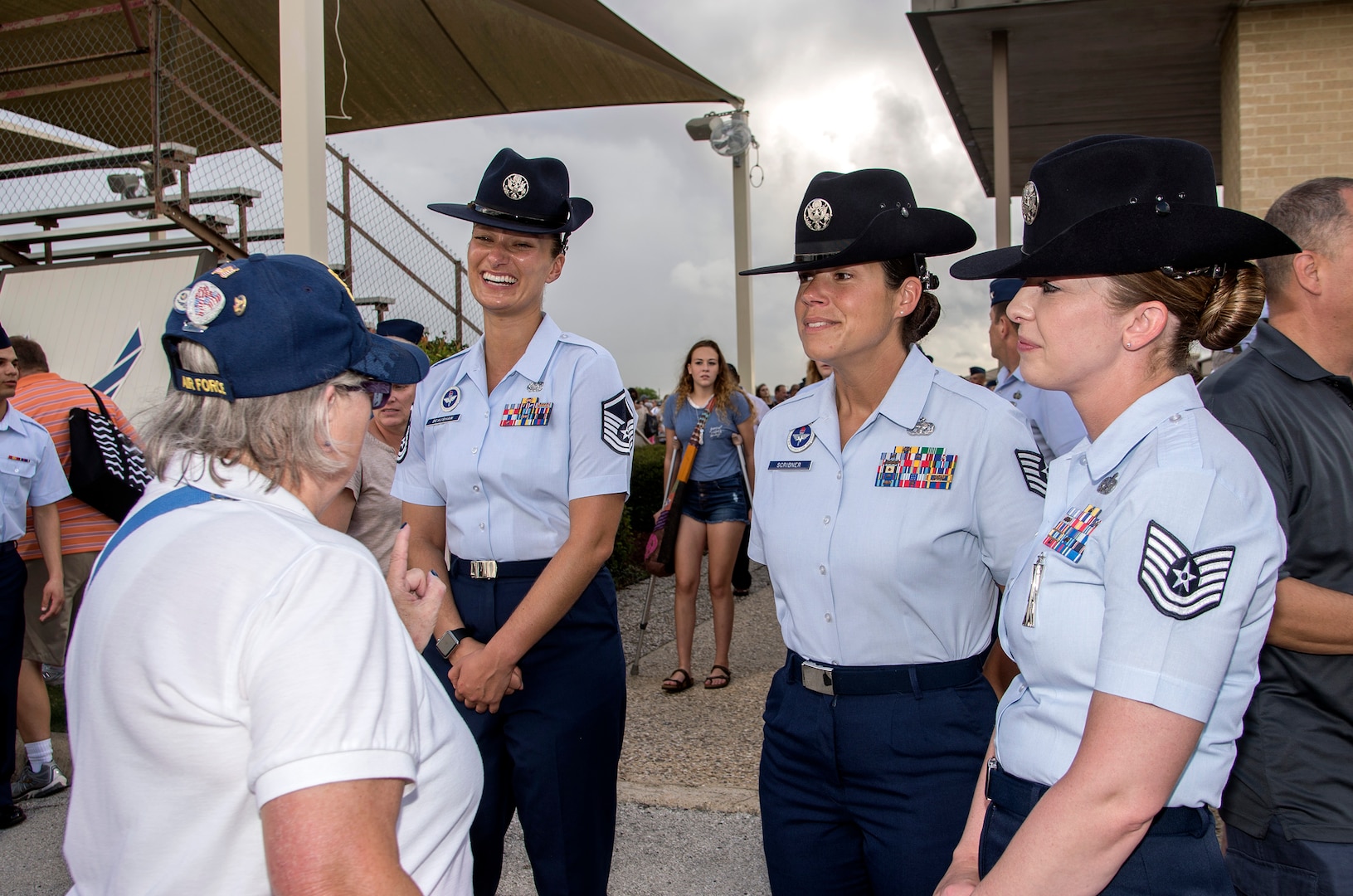 Military training instructors speak with female veterans, known as  Women in the Air Force, a term for women who joined the Air Force between 1949 and 1976, during the Air Force Basic Military Training graduation parade Oct. 7, 2016, at Joint Base San Antonio-Lackland’s parade grounds. JBSA-Lackland hosted a reunion of the WAF members and provided the veterans a tour of the base. WAF was founded in 1948 out of the Women’s Armed Service Integration Act, which enabled tens of thousands of female service members to find jobs in the Air Force. In 1976 women were accepted into the service on an equal basis with men. 