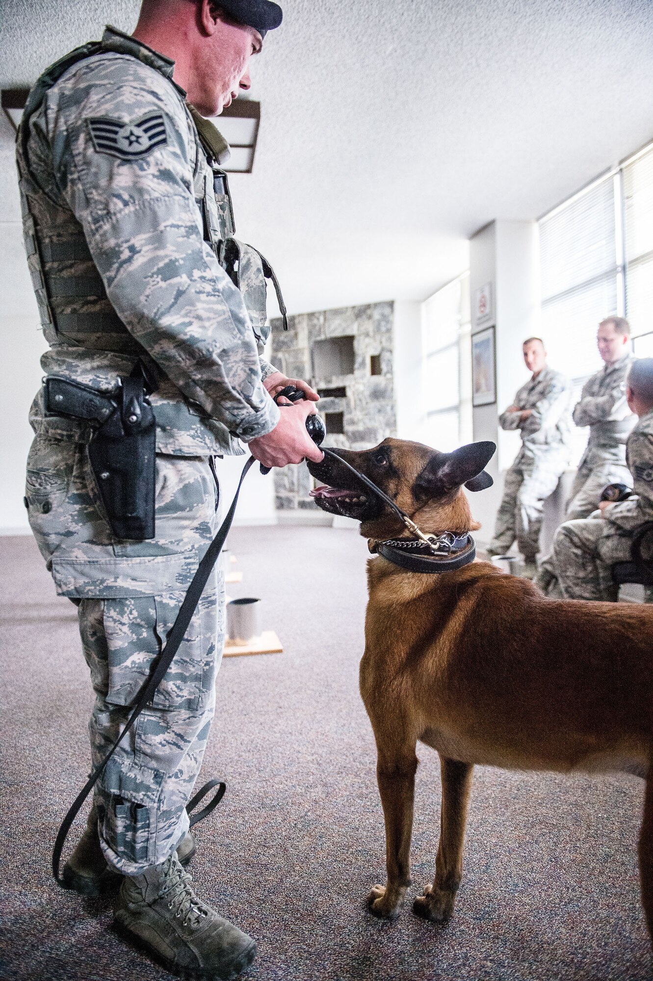 Staff Sgt. Matthew McCarty, 75th Security Forces Squadron, works with Xxuthus during imprint training Oct. 5 at Hill Air Force Base. The training consisted of explosive compound awareness for handlers and trainers, imprint training for dogs, and detection testing for teams. (U.S. Air Force photo by R. Nial Bradshaw)
