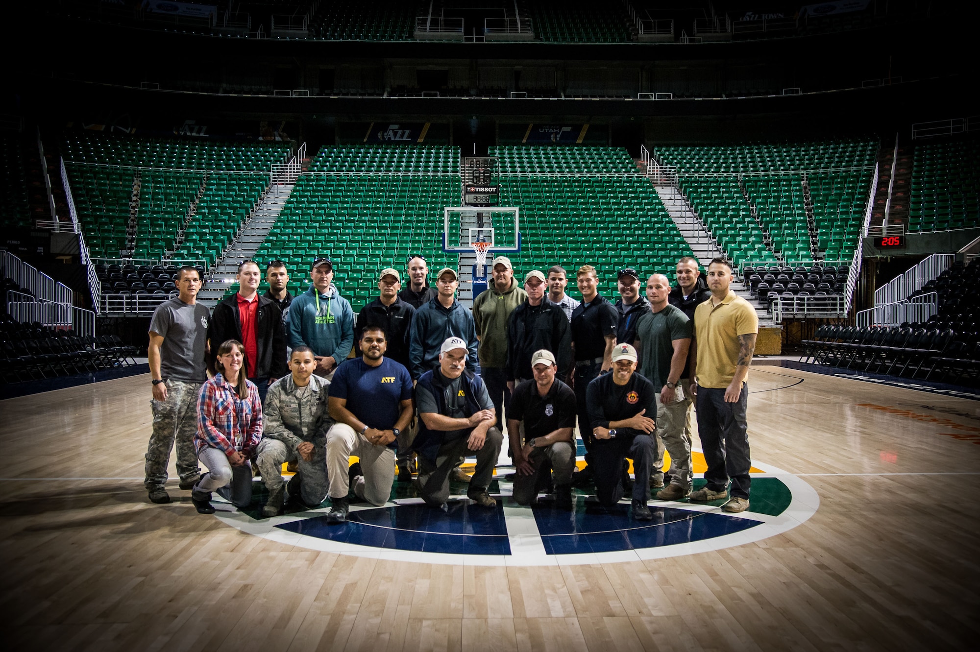 Airmen assigned to 75th and 366th Security Forces Squadrons pose for a group photo with ATF agents after completing a two-day training event Oct. 6 at Vivint Smart Home Arena, Salt Lake City. Bureau of Alcohol, Tobacco, Firearms and Explosives National Canine Division has successfully imprinted over 3,000 Defense Department military working dogs on HME. (U.S. Air Force photo by R. Nial Bradshaw)