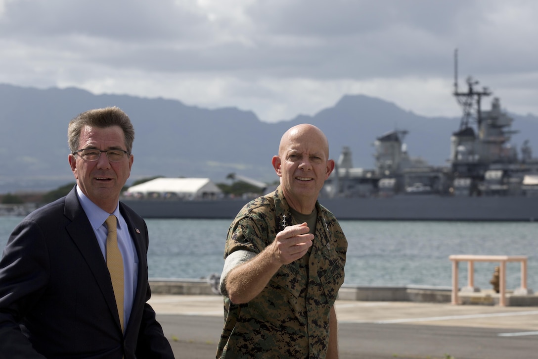 Secretary of Defense Ash Carter is greeted by Lt. Gen. David H. Berger on Joint Base Pearl Harbor-Hickam, Sept. 30, 2016. Carter attended a visit, board, search and seizure demonstration with military leaders during the U.S.-Association of Southeast Asian Nations Defense visit. Berger is the commander of U.S. Marine Corps Forces, Pacific.