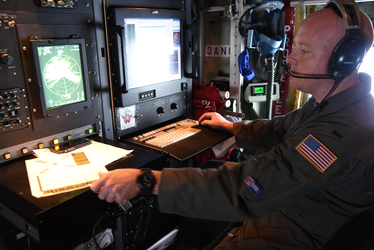 1st Lt. J. Kelsie Carpenter, 53rd Weather Reconnaissance Squadron aerial reconnaissance squadron officer, collects meteorological data during Hurricane Matthew Oct. 7, 2016. This data is sent to the National Hurricane Center to improve forecast track and intensity models. (U.S. Air Force photo/Maj. Marnee A.C. Losurdo)